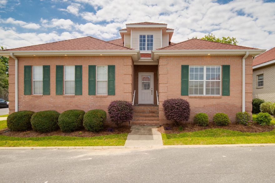 Experience the pride of Home ownership in the heart of Blue water Bay, without the hassles or time commitment of yard maintenance. Custom built home tucked away in Mediterranean Village in gated community, Magnolia Plantation, w/open floor plan & small zero lot line w/ pristine Landscaped grounds. High ceiling, beautiful Hickory Blue Ridge hardwood floors & an open floor plan make an immediate impact. An angled fireplace adds interest. Hard surface countertops, 42'' custom cabinets, eating bar, Pantry & 4 year old SS appliances accent the spacious kitchen. Offering a split floor plan, the Master w/crown molding & walk-in closet is located away from the other bedrooms. Wonderful Master Bath w/his & her sinks, jetted tub & walk-in-shower. Other features include plantation shutters,