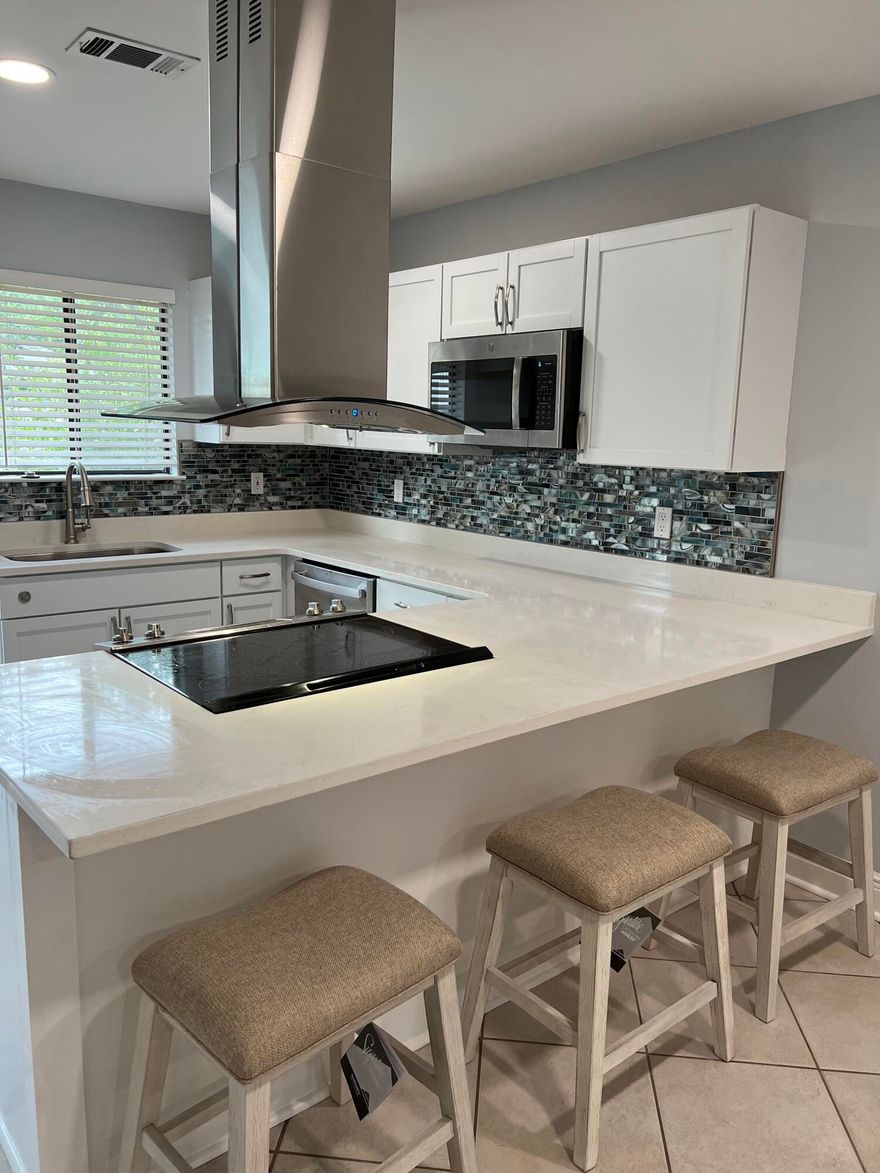 Nice townhouse with quartz counter top SS appliances oven, microwave and dishwasher just over a year old! Brand new refrigerator with Ice maker, new vanities and fixtures making it move in ready! Private back yard is fenced in with a storage shed. New roof in 2015, ac less than 1 year old. New water heater, HOA is $55/month, includes common area insurance, lawn care and external pest control. Unit has been great as a long term rental or would make a great starter home.