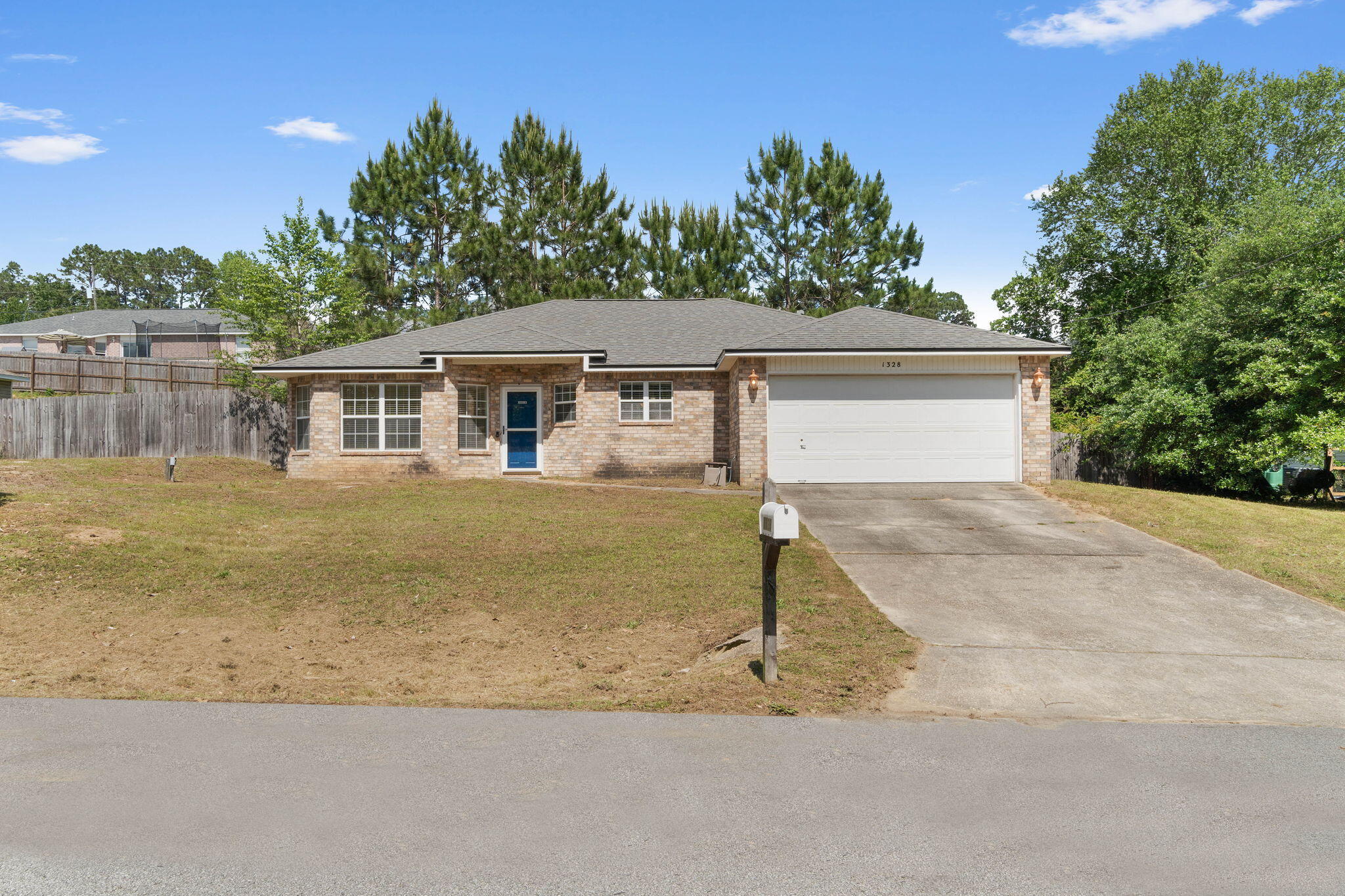 Welcome to 1328 Jeffrine Dr, a charming single-family home located in Crestview, Florida. This lovely 3-bedroom, 2-bathroom property offers an ideal blend of comfort and convenience, making it the perfect home for anyone looking to live in the southern part of Crestview.As you enter the home, you will be greeted by a spacious and inviting living room that features plenty of natural light, neutral colors, and high ceilings. The split floor plan seamlessly connects the living room to the dining and kitchen area, providing a perfect setting for family gatherings and entertaining guests. The bonus room towards the front of the house makes for a great office, kids' room, or a place to work out. The spacious kitchen offers ample counter space with an island, plenty of cabinets, and a pantry,