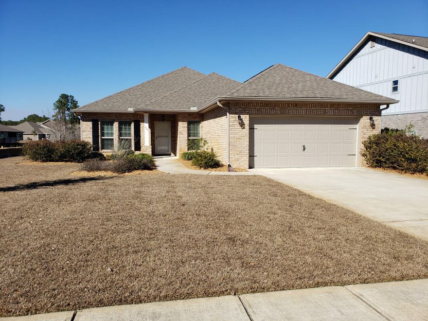 Beautiful 4 Bdrm/2 Bath lake front all brick home in Hammock Bay. Custom upgrades include; ceiling height kitchen cabinets and stone backsplash, tile plank flooring thru most of home, crown molding throughout house to include bathrooms and laundry room, recessed arched bookshelf with glass shelves, full height tiled showers with frameless glass, cabinetry in laundry room, oversized master shower, kitchen island with seating, storm doors front and rear, cased windows, 4 season Florida room with HVAC, R50 insulation in attic, lighted outdoor patio with brick ledges and a privacy wall, gutters, well water irrigation, and mature landscaping. The house comes with all upgraded appliances (including washer/dryer), alarm system, 7 ceiling fans, upgraded lighting, curtains and blinds, lots of shelving in every closet and in the garage, cell signal booster, patio and Florida room furniture. Community amenities include: 3 pools, tennis, pickleball, theatre, basketball, new gym and much more!