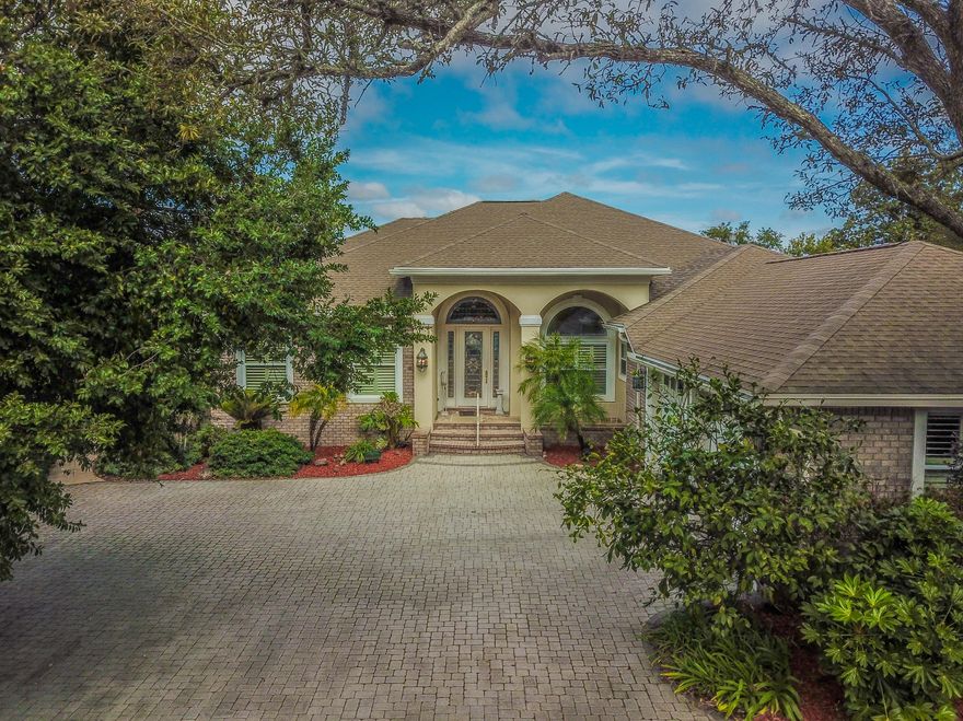 261 Yacht Club is paradise found. This majestic, waterfront property is every entertainer's dream. Built by Robert Fisher's Signature Builders, this 3,800 square foot 3 bedroom, 2.5 bathroom (4,990 total square feet) brick home  has an indoor/outdoor floor plan, the screened-in complete summer kitchen overlooks Cinco Bayou and a deep-water boat slip. This beautiful home has it all: engineered hardwood flooring throughout, top-of-the-line appliances, spacious kitchen for the most discerning chef, Billiards room, whole-house generator, instant hot water throughout the home, custom trim and many more custom details that make this home so special and a must see.
