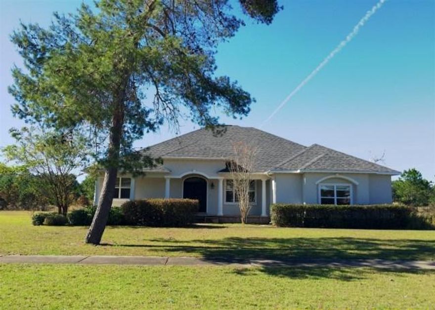 REO ~ This spacious 4 Bd / 3 Ba home is situated on the 3rd fairway in Windswept Estates. The home offers an open floor plan with ceramic tile floors in the foyer, kitchen, kitchen nook & all 3 bathrooms. There is a fireplace in the living room & there is a formal dining room perfect for gatherings. The master suite offers a large walk in closet & the master bath features double vanity, separate shower & garden tub. Enjoy entertaining on your large covered, screened porch. Windswept Estates is a golf course community featuring pool, playground & tennis courts. Don't miss out on this great home.