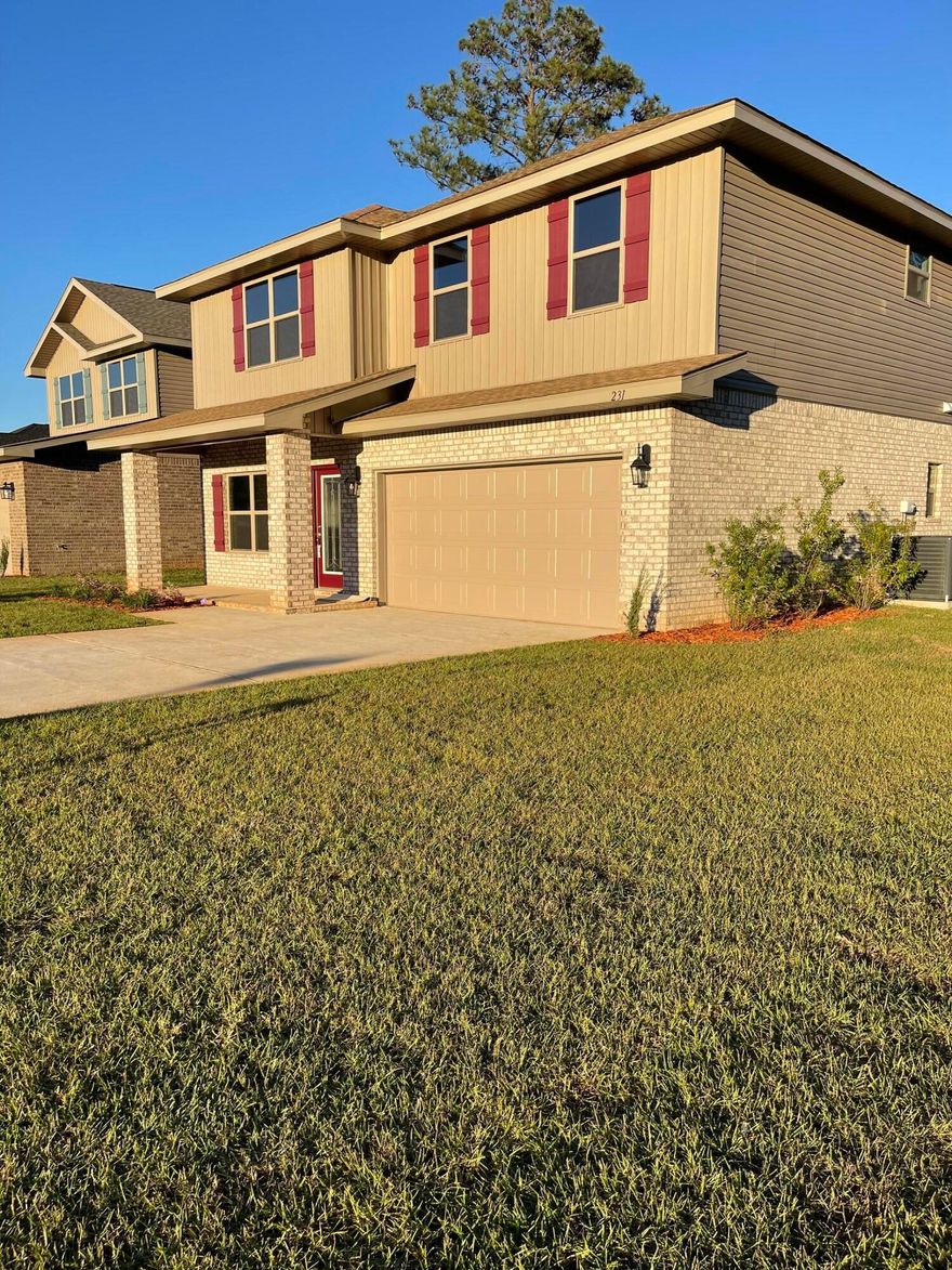 THGis is a 2 story 4 sided brick home with 6 bedrooms, 3.5 bathrooms and a bonus room! The master is on the first floor with the other 5 bedrooms and bonus room upstairs. The kitchen has an island covered in granite. Cabinets are solid wood and the pantry is conveniently located. The kitchen opens into the formal dining room and you'll find bull nosed corners in the formal areas.The master bedroom has a huge walk in closet. The master bath has dual vanities and has been upgraded with a walk in shower and garden tub. On the second floor you'll fall in love with all that space! The bonus room can be used for anything you can imagine. Laundry is on the second level as well. All floors with the exception of stairs and bedrooms have bedrooms have core tec flooring which is an upgrade.