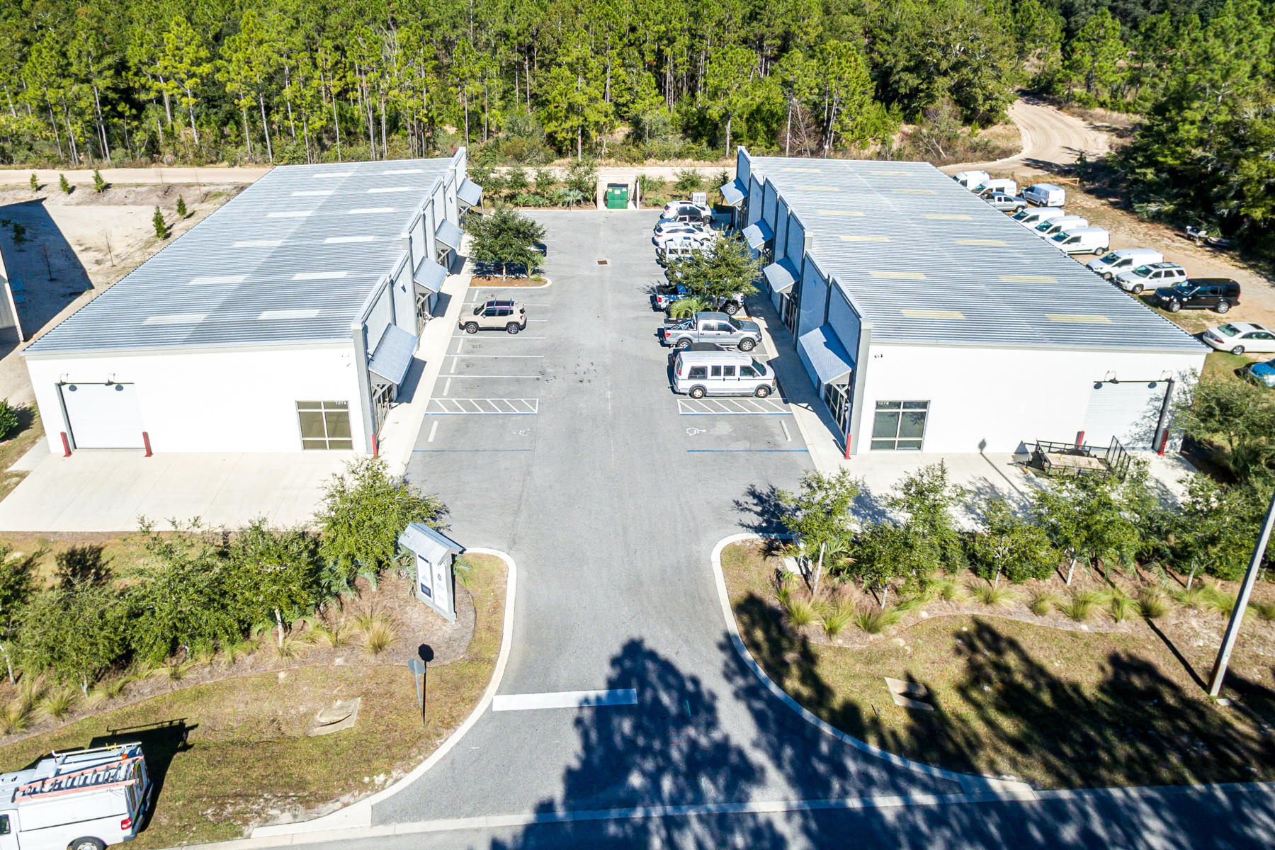 SIGNIFICANT PRICE REDUCTION! 13,600 SF of Superbly Constructed & Maintained Retail Storefronts, Offices, and Warehouses oriented on over 1 acre in St. Joe's South Walton Commerce Park of Santa Rosa Beach, Florida. This new income-producing opportunity includes 2 buildings, Building A & Building B, 7,000 SF & 6,600 SF respectively. Each building contains 4 demisable spaces, all 8 of which are 100% occupied. This site will perfectly cater to St. Joe's 50-year growth plan, known as the Bay-Walton Sector Plan. Please note the aerial photo illustrating the subject growth area. This low-density commerce park is positioned effectively and logistically to support the Okaloosa, Walton, and Bay County markets, conveniently accessible to Interstate 10, and is located...