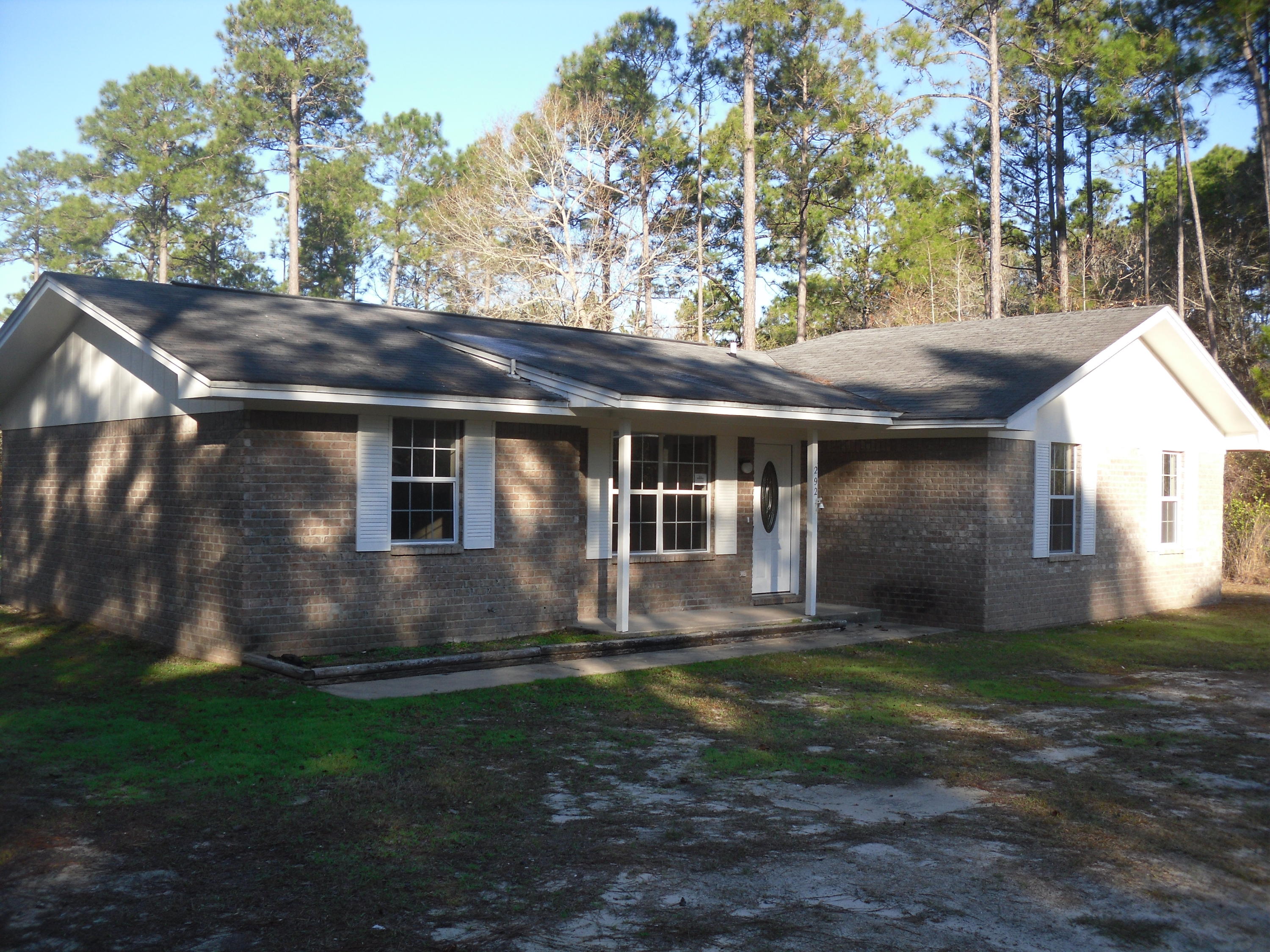 This is a cozy home tucked away on over an acre lot but very close access to US Hwy 331 which will put you less than 15 minutes to the beautiful beaches of South Walton County. Very nice detached garage/storage building gives you loads of storage and a place to keep all your toys. Call today for you viewing appointment.