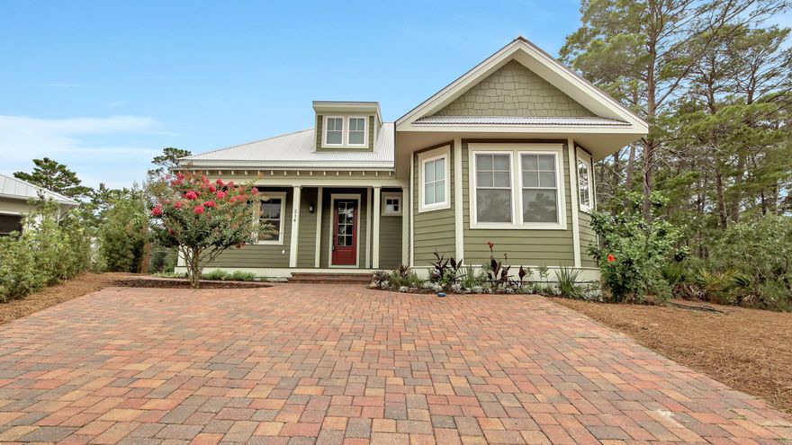 This adorable cottage style home is walking distance or golf cart ride to 2 public beach accesses, Butler Elementary School, the 30A bike path and Stinky's restaurant. This home is tucked back in a Cul de sac with a large screened in back porch facing the forest, perfect spot for relaxation. Natural landscaped back yard.
On a windy day you can here the waves crashing on the beach. A large back yard to add a pool in the future. Brick paver driveway
