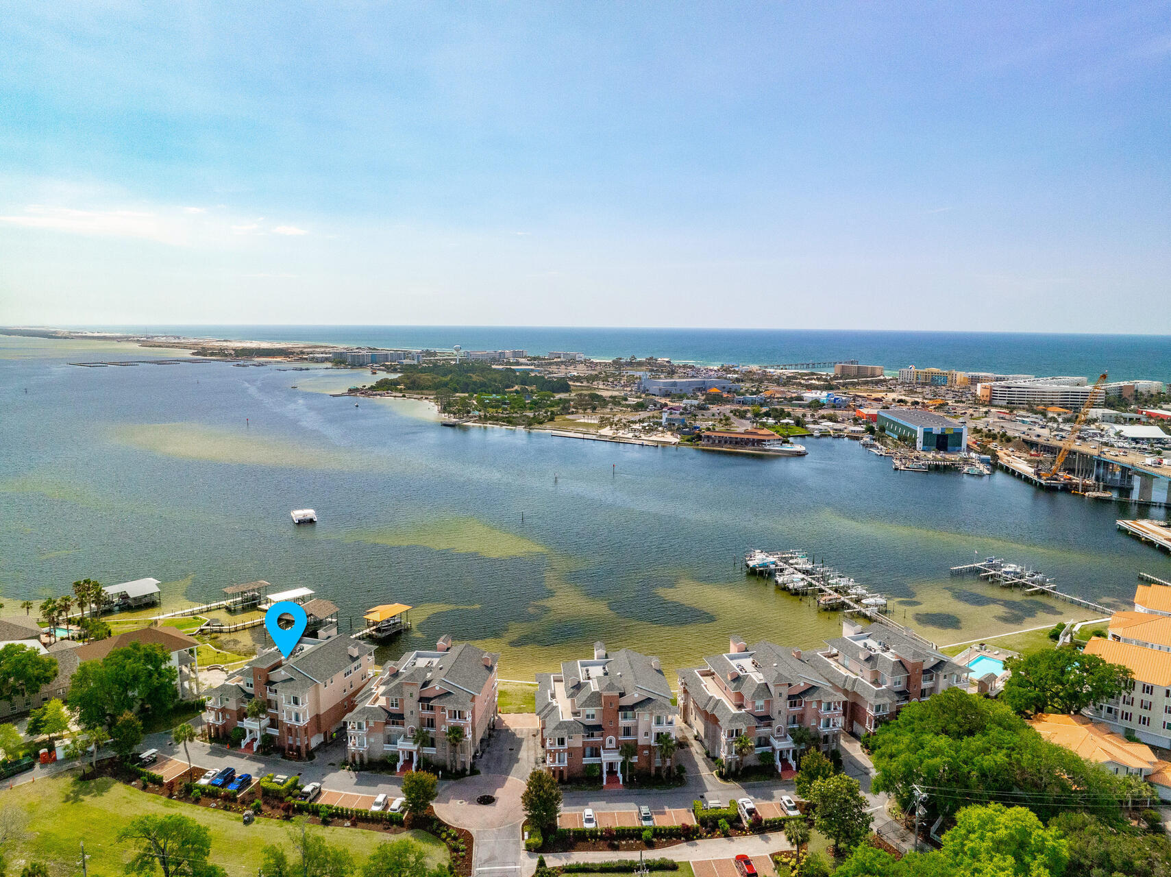E301 Villa Di Mare is a perfect opportunity for private, waterfront luxury living in the heart of downtown Old Ft. Walton Beach. NO short term rentals allowed makes for a real sense of community. Relax in a sprawling 2,266sf 3rd fl premier gated residence w/ sparkling Bay views from the open living area, DR, kitchen and MBR suite! The oversized balcony is perfect for watching fireworks, outdoor entertaining or relaxing. Lots of extras include a private 25' boat slip#6, community bayfront pool with bathhouse & sundeck, small private beach, your own 2-car garage and separate storage room. So much to enjoy! Watersports at your doorstep and convenient to the Gulf of America's #1 sugar sand beaches, Crab Island, downtown FWB dining, shopping and grocery right around the corner. You'll appreciate a secure coded building, elevator and garage and street entry for your convenience. Freshly painted throughout in neutral Dove White, this large open floorplan has 10' ceilings and offers a gourmet kitchen with granite countertops, a full array of Whirlpool appliances, wood cabinetry, tiled and LPV flooring which opens to LR with gas fireplace and floor to ceiling glass doors with a backdrop of the marvelous waterfront views of Choctawhatchee Bay and Santa Rosa Sound from your private oversized balcony. Plentiful windows allow flowing natural light. The Master bedroom has an ensuite large bath with separate shower, walk-in closet, whirlpool tub, and his/her vanities. 2 Guest bedrooms also offer large closets and private balconies overlooking the manicured landscaped lawn gardens. Elegant entry foyer offers a half bath powder room and off the kitchen laundry room with hookups, a/c and hot water heater. Pets for owners allowed. The location is a NO WAKE ZONE on the intercoastal waterway, so you can paddleboard, kayak or boat over to The Gulf Restaurant or Bay Cafe. Enjoy premier waterfront permanent or true second home living today at E301 Villa Di Mare! So much to appreciate - the perfect retirement or pure second home condo for those who want low maintenance, easy care luxury waterfront living convenient to everything!