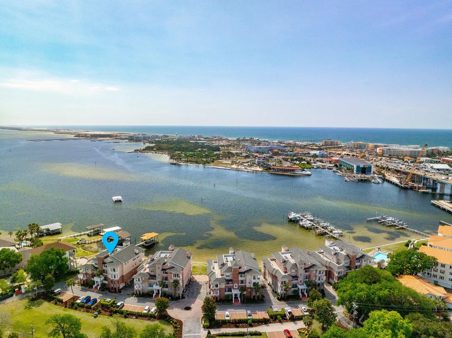 E301 Villa Di Mare is a perfect opportunity for private, waterfront luxury living in the heart of downtown Old Ft. Walton Beach. NO short term rentals allowed makes for a real sense of community. Relax in a sprawling 2,266sf 3rd fl premier gated residence w/ sparkling Bay views from the open living area, DR, kitchen and MBR suite! The oversized balcony is perfect for watching fireworks, outdoor entertaining or relaxing. Lots of extras include a private 25' boat slip#6, community bayfront pool with bathhouse & sundeck, small private beach, your own 2-car garage and separate storage room. So much to enjoy!  Watersports at your doorstep and convenient to the Gulf of America's #1 sugar sand beaches, Crab Island, downtown FWB dining, shopping and grocery right around the corner. You'll appreciate a secure coded building, elevator and garage and street entry for your convenience. Freshly painted throughout in neutral Dove White, this large open floorplan has 10' ceilings and offers a gourmet kitchen with granite countertops, a full array of Whirlpool appliances, wood cabinetry, tiled and LPV flooring which opens to LR with gas fireplace and floor to ceiling glass doors with a backdrop of the marvelous waterfront views of Choctawhatchee Bay and Santa Rosa Sound from your private oversized balcony. Plentiful windows allow flowing natural light. The Master bedroom has an ensuite large bath with separate shower, walk-in closet, whirlpool tub, and his/her vanities. 2 Guest bedrooms also offer large closets and private balconies overlooking the manicured landscaped lawn gardens. Elegant entry foyer offers a half bath powder room and off the kitchen laundry room with hookups, a/c and hot water heater. Pets for owners allowed. The location is a NO WAKE ZONE on the intercoastal waterway, so you can paddleboard, kayak or boat over to The Gulf Restaurant or Bay Cafe. Enjoy premier waterfront permanent or true second home living today at E301 Villa Di Mare! So much to appreciate - the perfect retirement or pure second home condo for those who want low maintenance, easy care luxury waterfront living convenient to everything!