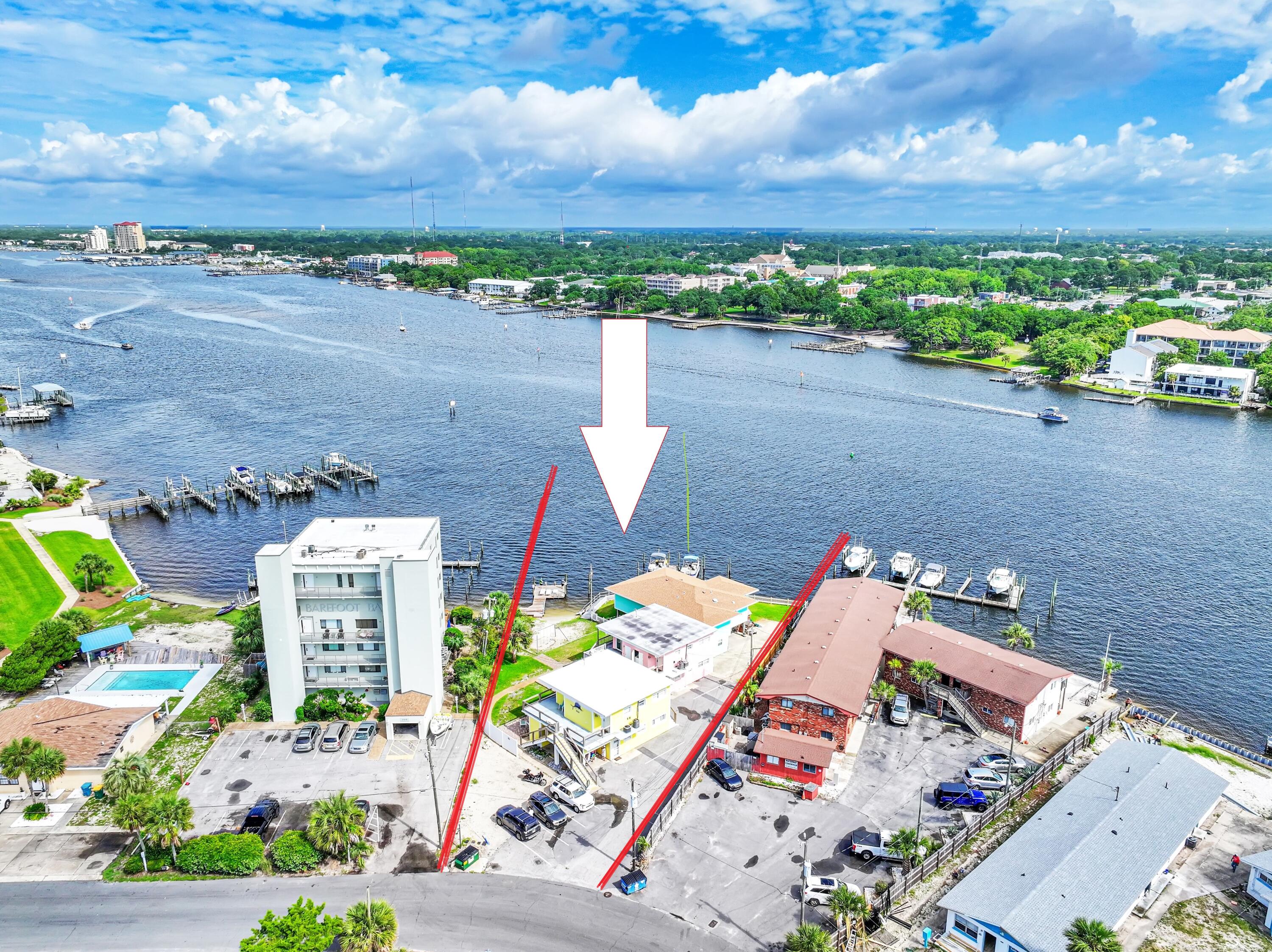 Stunning Waterfront Property on Okaloosa Island 🌴Immerse yourself in the allure of coastal living with this exclusive property located mere steps from the shores of the Gulf of Mexico on Okaloosa Island. A hidden gem on the coveted Emerald Coast. Just a leisurely 8-minute stroll from the pristine white sands of the Gulf of Mexico, this oasis beckons with its unbeatable location and breathtaking views. 8 minutes walk to the Beach access .One mile from the Gulfarium Marine, 10 minutes to Crab Island. These are 7 beach accesses near by. Few miles to down town. This beautiful waterfront property with a dock is perfect for enjoying both the property and taking a boat ride to Crab Island. Enjoy adventures, water sports, and relaxation. PAR ID 00-2S-24-2185-0003-077A & 00-2S-24-2185-0003-0770