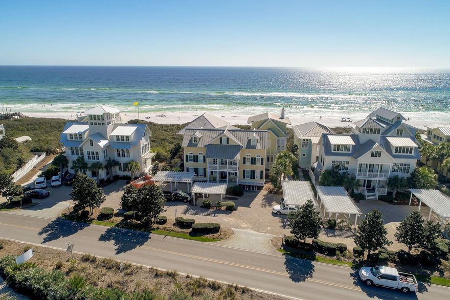 This highway 30-A Gulf front property is a stunning three story, 5 bedroom home located in the Gulf District of WaterColor. This professionally decorated home offers elegance and comfort at the beach! The first floor gives way to a large living area and screened in porch. Also on this level are 3 guest bedrooms all with private connecting bathrooms. On the second floor, you will find a second living room and a guest bedroom. There are balconies to the front and to the back of this house with the one in the back boasting beautiful gulf views. For the third floor, the master suite has exceptional gulf views and connects to an over sized master bathroom that has a large Jacuzzi tub and separate shower. The second and third floor balconies are ideal for an early morning coffee while taking in  in the sounds and view of the Gulf of Mexico.