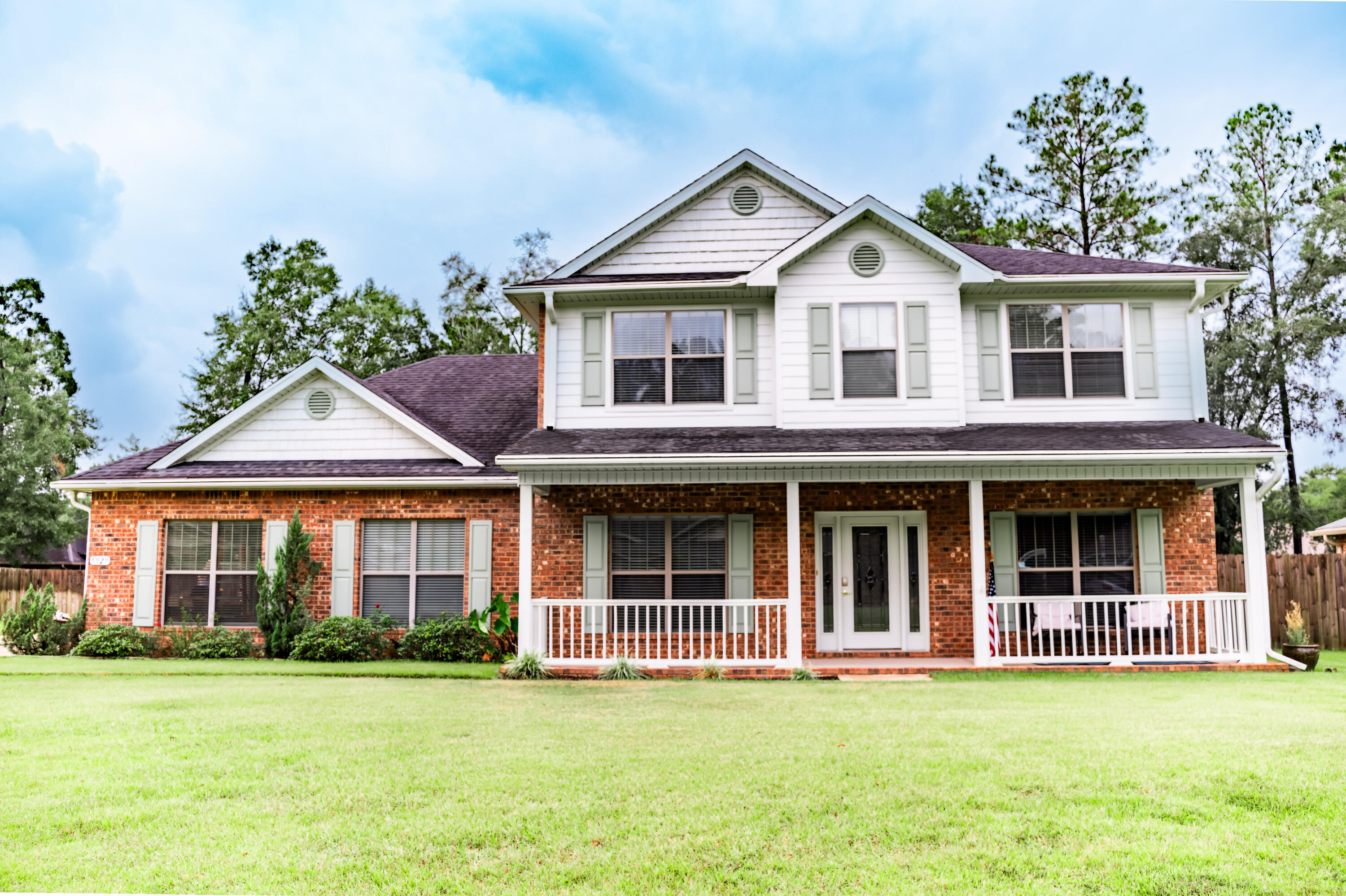 Don't miss this 5 bedroom home located in the desirable Wind Meadows neighborhood of Crestview! Pride of ownership shines in this well maintained home offering the perfect balance of privacy and convenience--just minutes from schools, shopping, and dining. Featuring 5 bedrooms and 2.5 baths, the open floor plan showcases a chef's kitchen with granite countertops and a private, must-see main-floor owner's suite. Upstairs you'll find oversized bedrooms and plenty of extra space. Also offering outdoor living at its best with a covered front porch, screened back porch, and large fenced backyard--all with easy access to Hwy 85. Come check it out!!