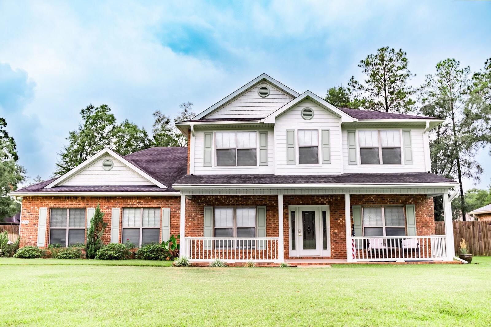Don't miss this 5 bedroom home located in the desirable Wind Meadows neighborhood of Crestview! Pride of ownership shines in this well maintained home offering the perfect balance of privacy and convenience--just minutes from schools, shopping, and dining. Featuring 5 bedrooms and 2.5 baths, the open floor plan showcases a chef's kitchen with granite countertops and updated kitchen cabinetry. There's a private, must-see main-floor owner's suite that offers amazing space. Upstairs you'll find oversized bedrooms and plenty of extra space. Also offering outdoor living at its best with a covered front porch, screened back porch, and large fenced backyard--all with easy access to Hwy 85. Come check it out!!