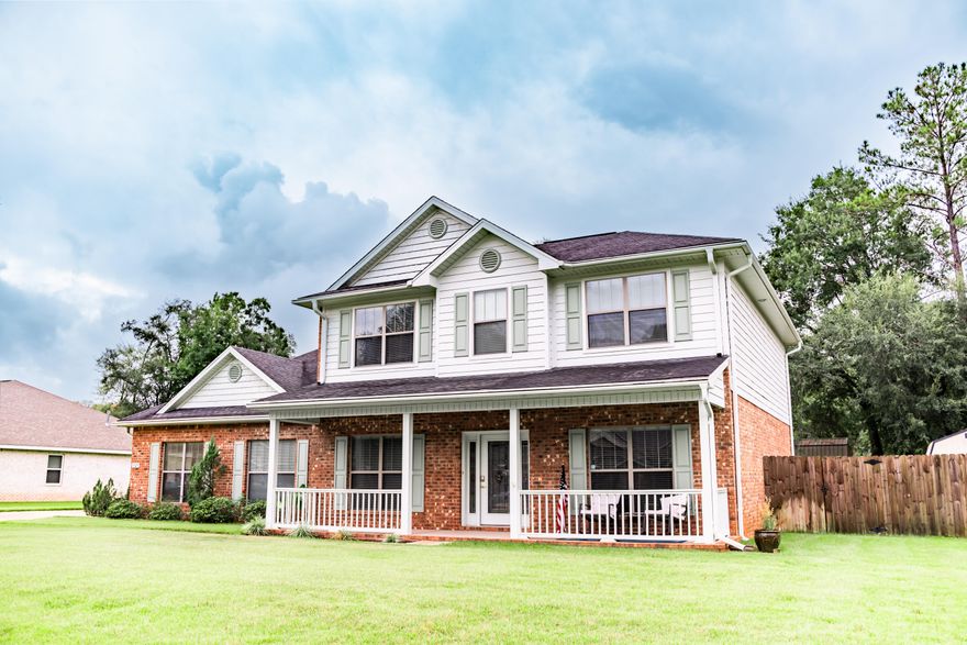 Don't miss this 5 bedroom home located in the desirable Wind Meadows neighborhood of Crestview! Pride of ownership shines in this well maintained home offering the perfect balance of privacy and convenience--just minutes from schools, shopping, and dining. Featuring 5 bedrooms and 2.5 baths, the open floor plan showcases a chef's kitchen with granite countertops and updated kitchen cabinetry. There's a private, must-see main-floor owner's suite that offers amazing space. Upstairs you'll find oversized bedrooms and plenty of extra space. Also offering outdoor living at its best with a covered front porch, screened back porch, and large fenced backyard--all with easy access to Hwy 85. Come check it out!!