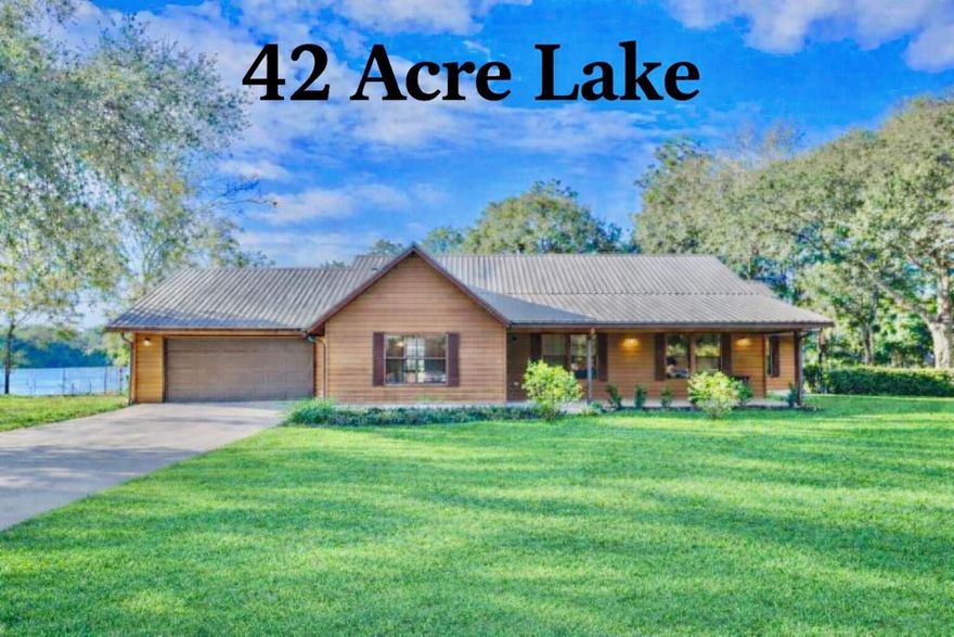 This is a first-time offering for this waterfront property priced to sell. The home is five minutes from downtown Crestview, located at 3066 Craig Terrace, a beautiful, quiet, well-appointed tree-lined street. This beautiful home is situated quietly on one of Crestview's largest lakes, spanning nearly 42 acres. Keep your John boat on your dock and go fish because this beautiful lake has Florida largemouth bass, blue channel catfish, bream, and crappie. You will enjoy watching the sunsets over the lake on the screened-in back porch. The property spans 1.66 acres with fruit trees, a large yard, and a custom shed measuring 12x32x12 with overhead loft storage. This home is a sprawling 2,130 square foot one-level ranch 3 bedroom 2 bath with a living room for a Home Office. The home boasts an oversized 2.5-car garage and a large driveway for six vehicles.  If you're looking for serenity, your search is over.
