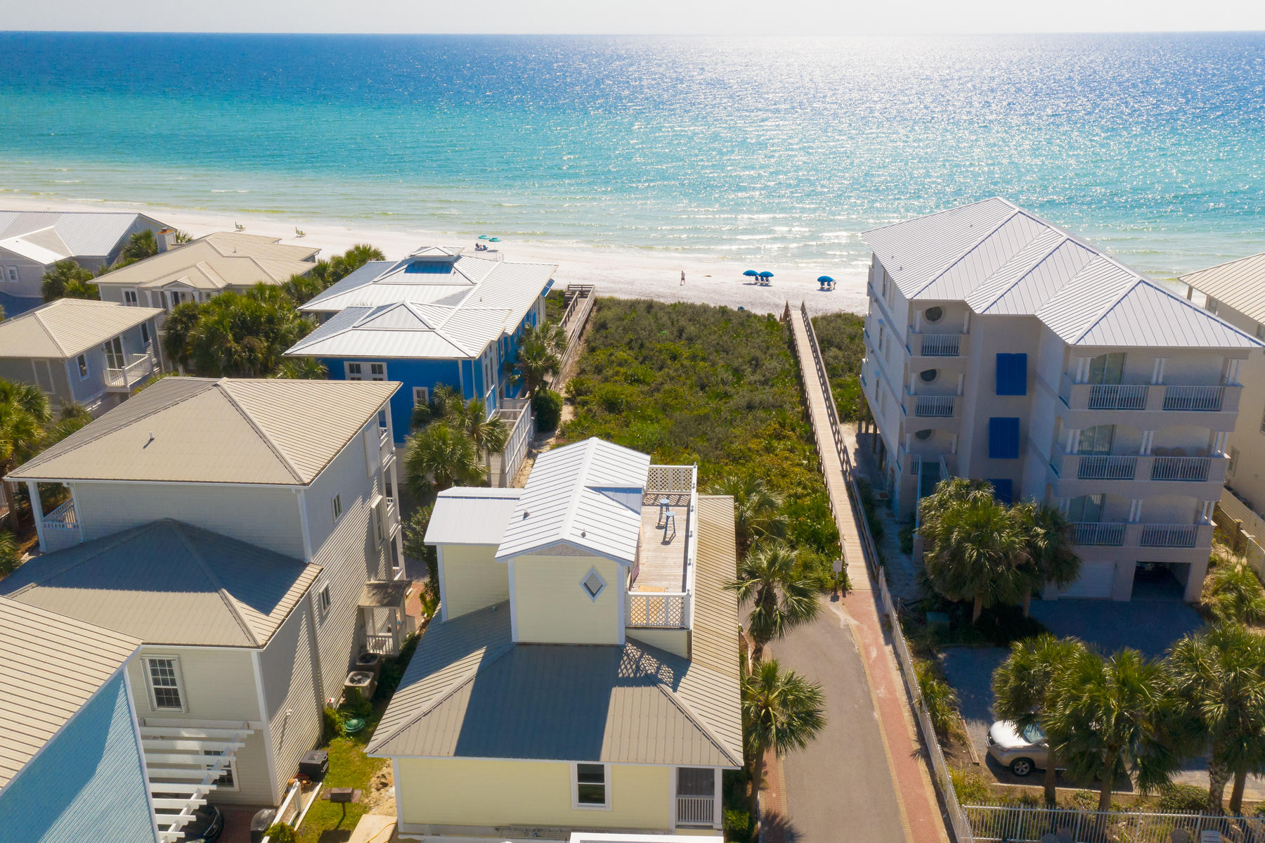 This charming three-story beach cottage in Seagrove presents like new, thanks to a recent makeover . Every floor of this well-located home has a covered terrace, deck or open balcony delivering unobstructed gulf views to captivate the eye. Fully furnished and professionally decorated by Bella Beach . Remodeling includes new flooring, countertops and freshly painted dcor complemented by modern bathrooms (all 5.5 of them). Five bedrooms, 4 of which are king-bed master suites, plus a bunk room with 1 queen and 3 twin xl, make this a popular home for entertaining or renting out when not in use by the owners. From the second floor master suite, your first view every morning will be of dazzling white sand lapped by azure waters sparkling in the morning sun.