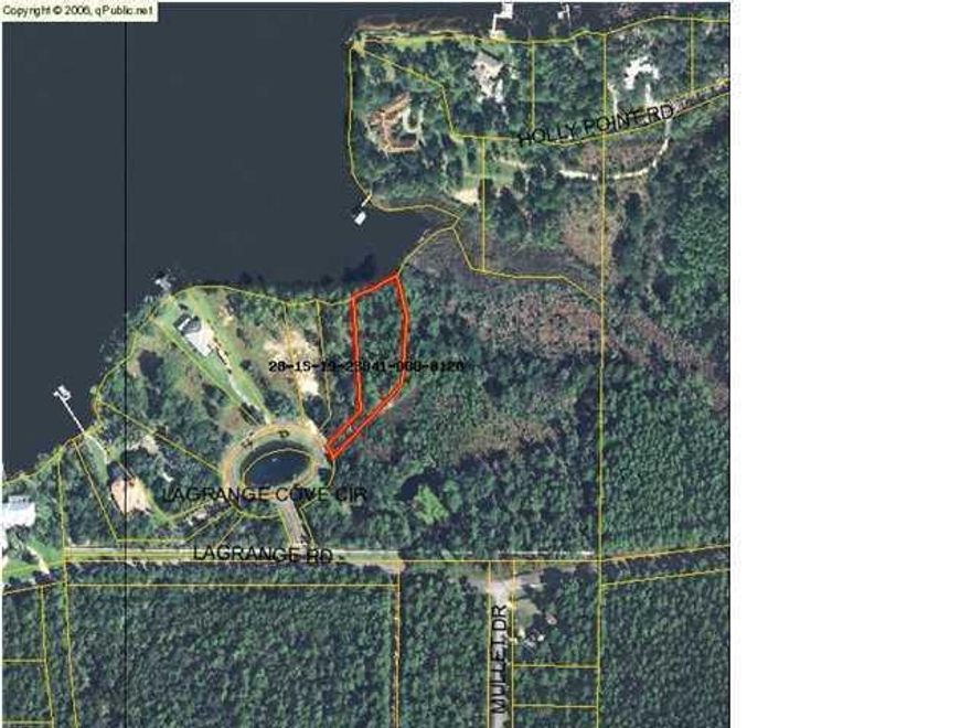 PRIVATE, WATERFRONT, ESTATE SIZED LOT! Looking for a picturesque, waterfront, lot in a gated community to build your dream house on? Look no further. This beautiful, waterfront lot on LaGrange Bayou is located in LaGrange Cove, an exclusive and upscale subdivision of only 12 waterfront homes. Offering 9/10 of an acre which borders a 7 acre natural preserve, this lot provides maximum privacy and plenty of room to accommodate a main house, guest house and/or pool. Other community amenities include 2 beautiful lakes and paver stoned streets. Located just 10 miles from Hwy 98, restaurants, shopping and the beach are just a short drive away. HOA only $750 annually. Come see this piece of paradise today.