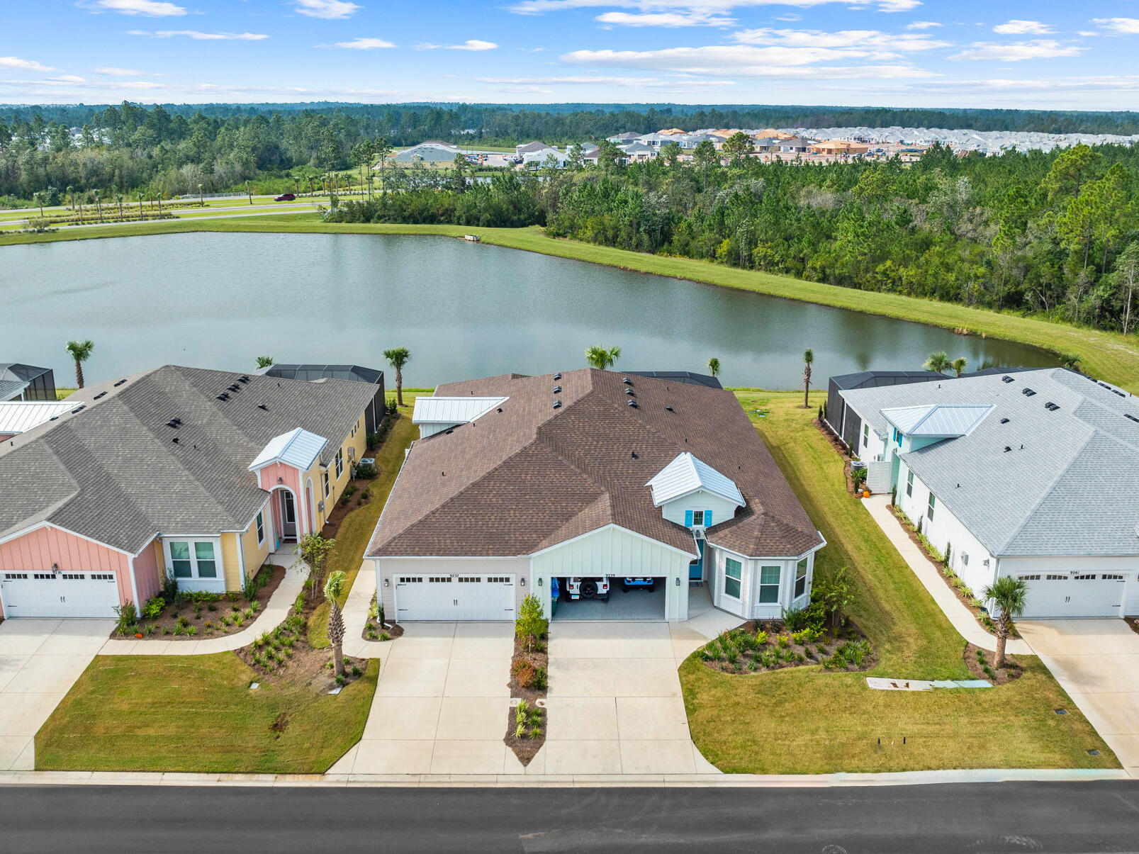 This newly built, well designed Tortola Model features 2 bedrooms, 2.5 baths, a versatile flex room, and a 2-car garage. Step inside and you'll immediately notice the elegant touches, like coffered ceilings that add an extra foot to the ceiling, upgraded lighting fixtures and gorgeous bright vinyl plank flooring throughout. Enjoy views of the pond and natural preserve from your primary suite and living room, or relax in the perfect setting of your covered screened lanai. Inside, the open-concept kitchen is a true focal point, with its stainless steel appliances, large island, and custom lighting. Living in Latitude Margaritaville grants you access to resort-style amenities such as pools, live music, a fitness center, and endless activities--phase 2 is coming soon with more to enjoy! Living in a place like this isn't just about the homeit's about the lifestyle that comes with it. Have you ever dreamed of living in a top-rated community that offers both luxury and a vibrant lifestyle? 