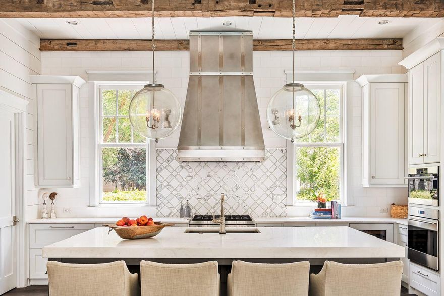 Nestled on a quarter-acre corner lot in the heart of desirable Phase III in WaterColor is a home that provides ample space courtesy of it's impressive scale, while it's breathtaking design and complete privacy offer refined livability. Even in WaterColor, the T.S. Adams-designed 103 Sand Hill Circle is a rarity packed into a 5,843-sq.-ft. Package, highlighted by a truly premier location, overlooking Sand Hill Park and the ever-popular frog pool.The meticulously cared for and never rented home, offering crisp coastal architecture, features six bedrooms total, with the pronounced master suite on the first floor, four additional suites on the second floor and a private retreat in the carriage house.