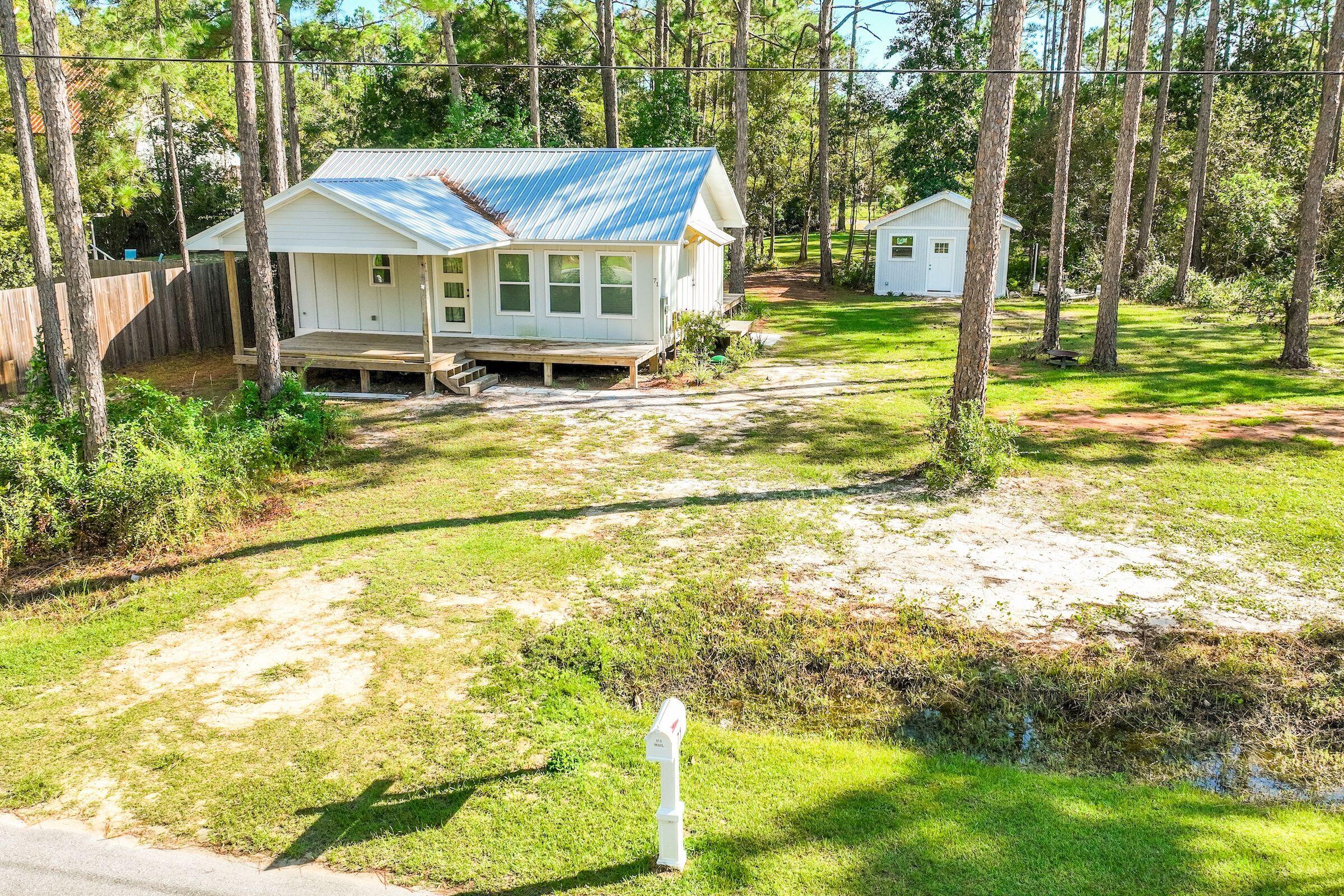 Cozy 1 bedroom 1 bath cottage in desirable Santa Rosa Beach. Newly built, this open floorplan home has all the modern amenities and privacy. With all utilities paid by owner (power, water, Direct TV, internet, lawn-care, etc.)  the home comes fully furnished and ready to move in. With a huge walk-in shower, the gorgeous bathroom is fit for best. Sitting on a huge .44 acre lot, enjoy the seclusion yet the convenience to nearby amenities like the Cessna Landing boat launch, working, shopping and dining in nearby Sandestin and the surrounding South Walton focal points. Lease term is negotiable. Lease purchase with owner financing also available. Available March 1, 2025.