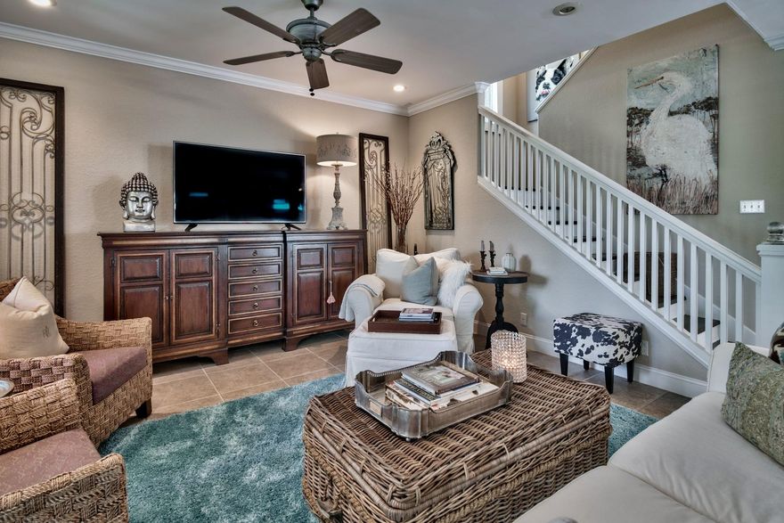 Elegant coastal charm paired with ample privacy characterize this peaceful bay-side retreat ideally situated to capture beautiful water views while offering extraordinary proximity to surrounding community amenities such as the world class grand boulevard commercial complex, Sacred Heart Hospital and the pristine beaches of scenic highway 30A. This Floridian cottage exemplifies a slower pace of life with ample screened porches perfectly positioned to capture views over the Choctawhatchee Bay. The open floor plan caters to entertaining with curated detail such as antiqued interior doors & lighting, reclaimed wood finished and ship-lap accent walls. The first level features an oversized living room flowing seamlessly into the dining room and eat-in kitchen which offers ample custom cabinetry