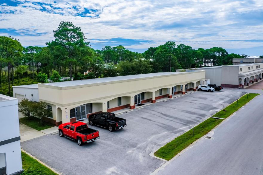 PRICE SHARPLY REDUCED!!  An approximate 8,050 SF Showroom/Office/Flex/Warehouse space in a centralized location of Miramar Beach, between Destin and Santa Rosa Beach, Florida. Approximately 4,600 SF of the building is occupied by a single tenant, while the remaining 3,450 SF is vacant.  There is a potential to divide the building into (4) units with existing storefronts and entries.
