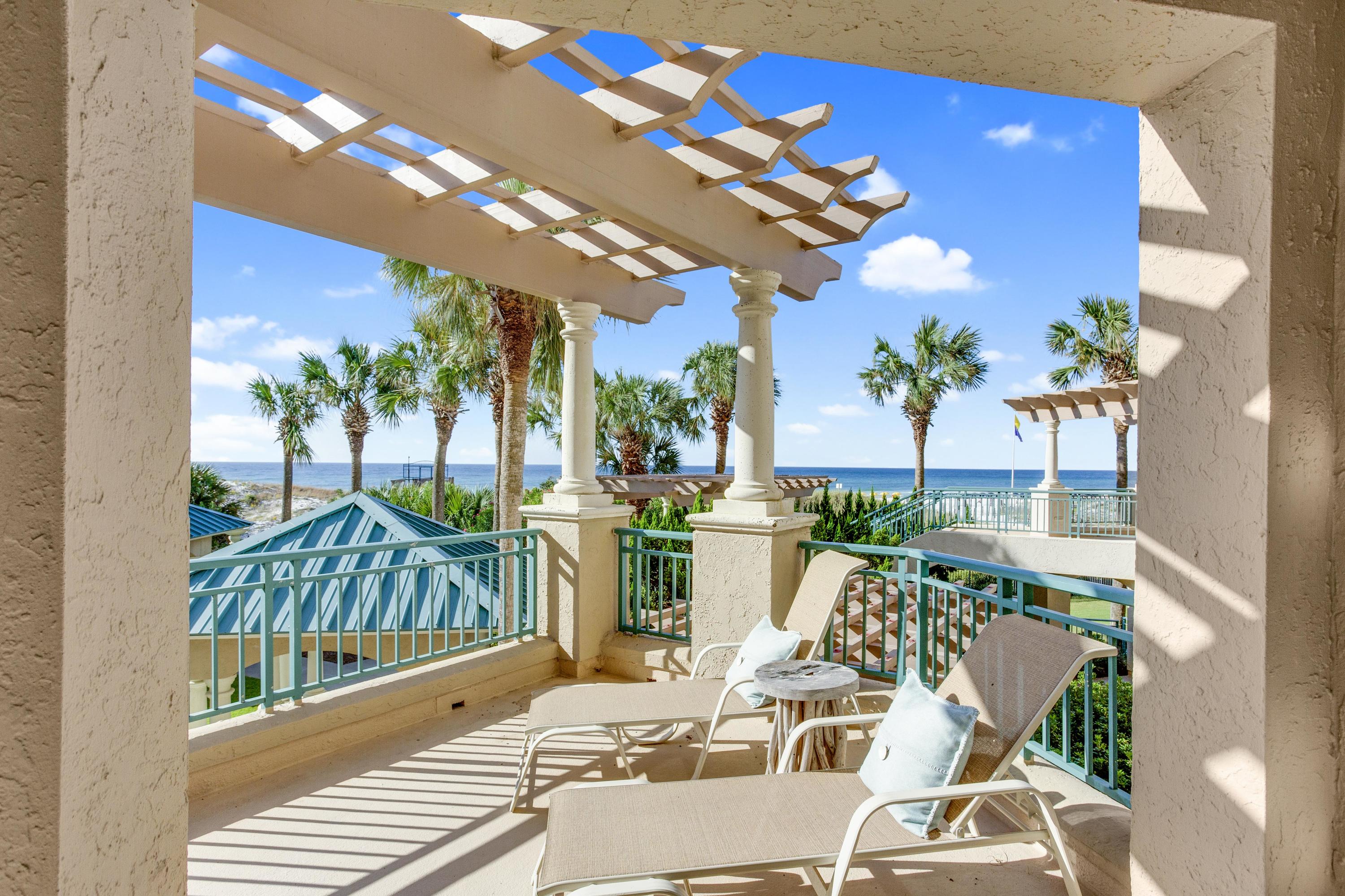 A unique opportunity to own this beautifully furnished 2 story condo tastefully updated with a coastal chic design and with wonderful gulf views. This spacious condo features a large entertaining area and wet bar complete with full size double door refrigerator, ice maker, and wine cooler. The open floor plan offers a relaxing living room, dining area, and fully equipped kitchen. There are four large bedrooms - two on the main level and two downstairs, each with their own en suite bathroom. Plenty of outdoor entertaining space with a large covered balcony off the main floor living areas and a covered patio on the lower level . No elevator needed to access the condo, pool or private Southwinds owners beach; just walk right in to the main floor of your own piece of paradise.