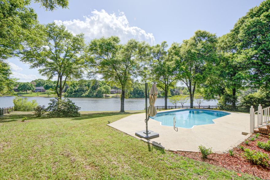 Lakefront Living on Lake Victoria - Updated and Move-In Ready!

Welcome to this stunning 3-bedroom, 2-bathroom, 1,709 sqft lakefront home nestled on the peaceful shores of Lake Victoria. This property offers the perfect mix of comfort, character, and upgrades—ready for you to move right in and enjoy Florida living at its finest. This home also has an assumable FHA loan at 2.5% 

Surrounded by mature oak trees and bursting with curb appeal, the home greets you with a wide front porch perfect for morning coffee or unwinding in the evening. Step inside to an open and airy floor plan featuring a fresh coat of paint, a cozy fireplace, and new windows that flood the home with natural light and frame serene views of the lake and backyard oasis. The kitchen and main living areas flow seamlessly out to a spacious covered back porch, overlooking a saltwater pool with a brand new liner, ideal for entertaining or relaxing in total privacy. The backyard feels like a hidden retreat, with direct access to the lake and ample space to soak in the surroundings.

Additional upgrades include new gutters, refreshed landscaping, and tasteful finishes throughout. The azaleas may have just finished blooming, but this home offers natural beauty in every season.

Homes on Lake Victoria are rarely availabledon't miss this opportunity to own a truly special property!