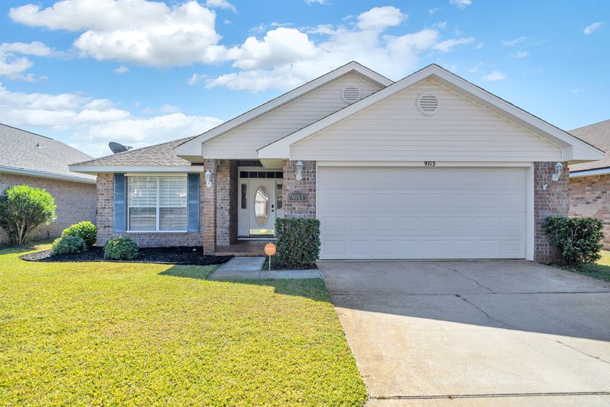 This beautiful 4 bedroom/ 2 bath brick home is located in the heart of Navarre. This home is spacious with a cozy feel. Lots of natural light through out. The kitchen offers a generous amount of cabinet and counter space. In the master bedroom you will find a beautiful on suite with double vanity and a large walk in shower. The home offers large guest rooms as well. All hard flooring throughout make it perfect for future rental potential. Out back you can find yourself enjoying the enclosed porch or bbqing on the patio. The neighborhood includes a community pool, picnic area and walking trails. Don't miss out on this home!