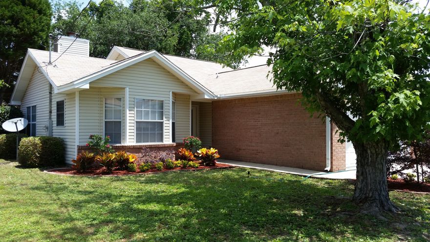Beautifully updated home convenient to Eglin Air Force Base and Hurlburt Field. Fantastic all new eat-in kitchen with stainless appliances including smooth top stove, microwave and refrigerator. Interior freshly painted, new carpet and wood look vinyl just installed. Roof was replaced in 2015. Good curb appeal with pretty landscaping. Brick and vinyl exterior for easy maintenance. Cathedral ceiling in the living/dining combo and a tray ceiling in the master bedroom for a more spacious feeling. Wood burning fireplace in living room for cozy winter evenings. Inside laundry room has shelving for extra storage. Privacy fenced back yard with open patio and mature shade trees is great for cookouts. All this home needs is a new owner.