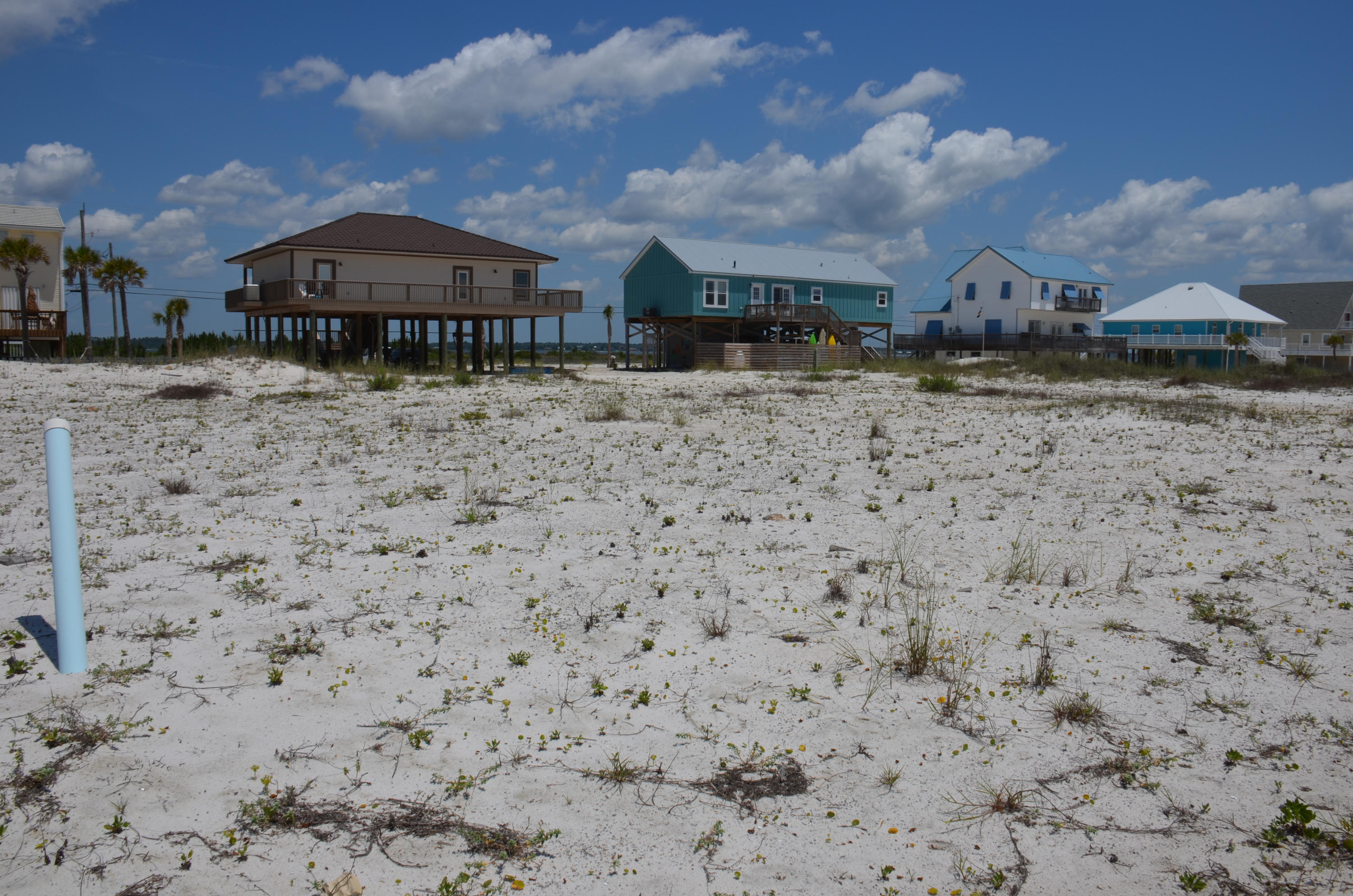 GULF VIEW LOT. 100X125 lot located across the street from the Gulf of Mexico with easy access to the Beach. Navarre Beach is one of last places in Florida that offers the old Florida lifestyle with Emerald Green waters, Sugar white sands, Miles of bike and walking paths, Fishing Pier, Gulf Islands National seashore to the west and County park to the east with snorkeling and fishing. Buyer to verify all information to buyers satisfaction including but not limited to lot size, zoning etc.