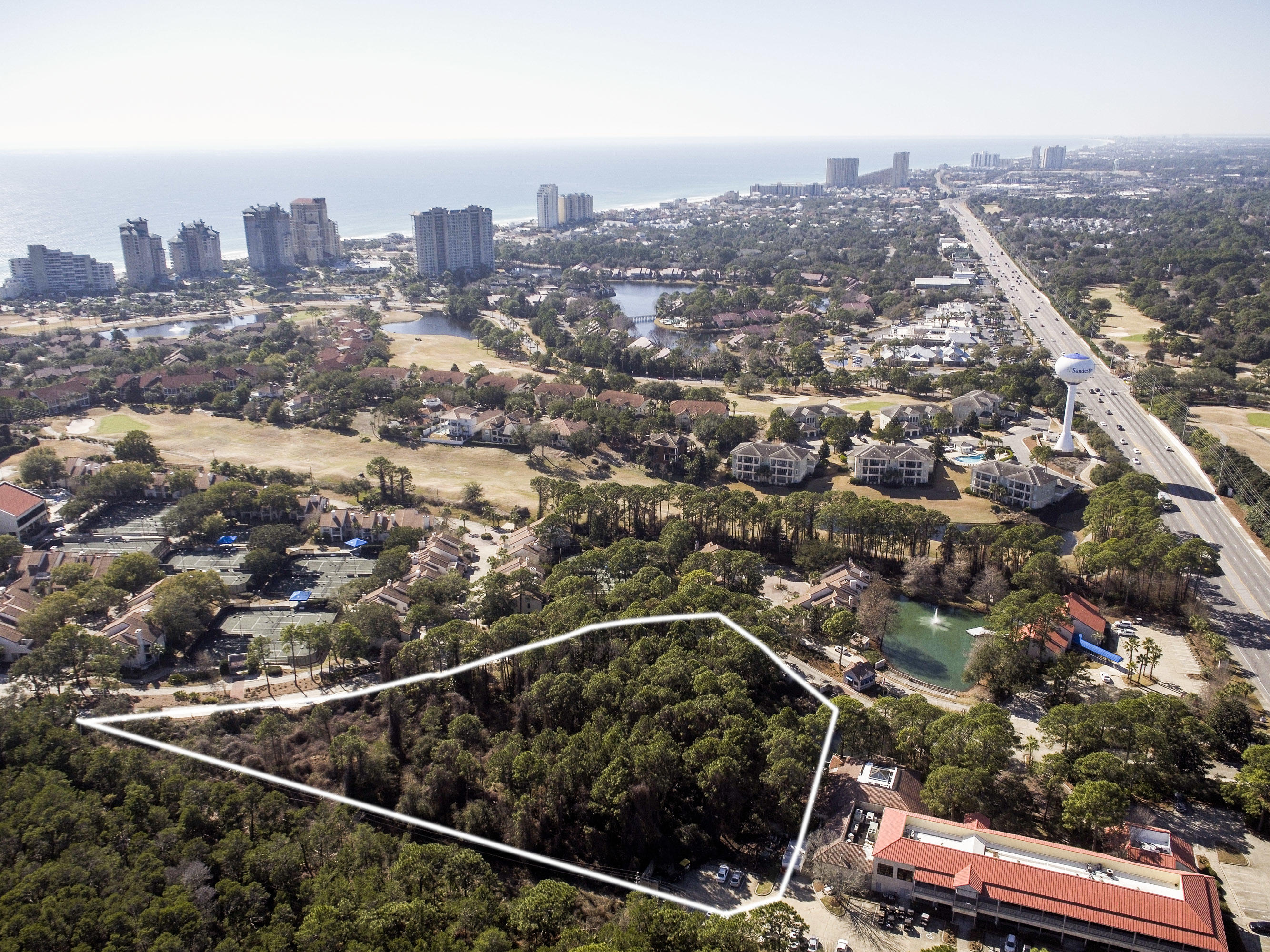 3.3 acres inside the prestigious Tops'l Beach and Racquet Club. This developable parcel is zoned Coastal Center and currently has an approved development order for 114 condo units. A great opportunity here to build inside a Gulf front 52 acre resort that is low density and well located on the eastern side of Sandestin. Condominium, single family, hotel, bed and breakfast are all considered in the highest and best use of this parcel. Come be part of the Tops'l Community!