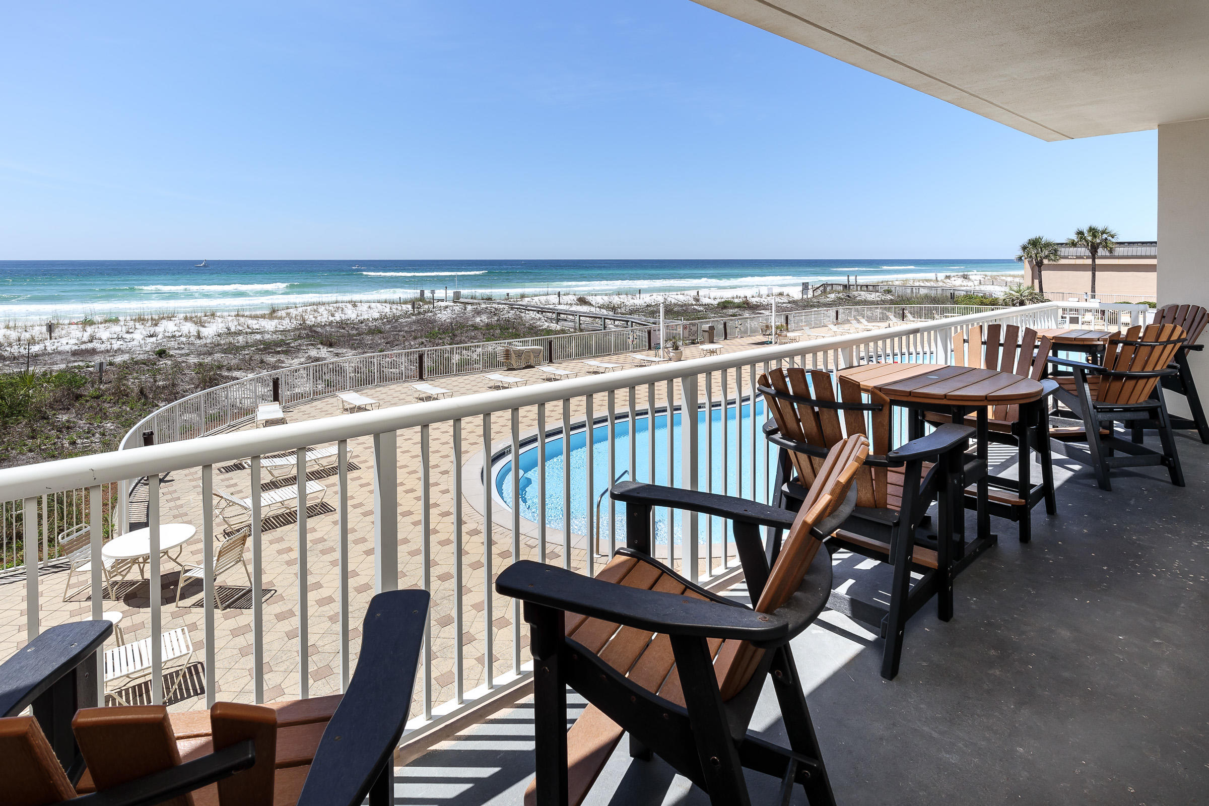 Summer Place is premier Gulf front building and rarely has units come available. This development has 230 feet of beachfront sand with a wide expanse. Proven income producer as the owner has been self-managing since 2014 and has a transferable list of repeat clients. The property has flawless VRBO reviews and consistent income year after year. This stunning second floor unit has endless views of the Gulf of Mexico. The spacious living area and well appointed master bedroom both have phenomenal views of the emerald waters of the Gulf of Mexico. Sleeping eight, the first suite offers a king size bed with ensuite bath, two full sized beds in the second bedroom, an additional bedroom features a queen bed, and there is a sleeper sofa bed.
