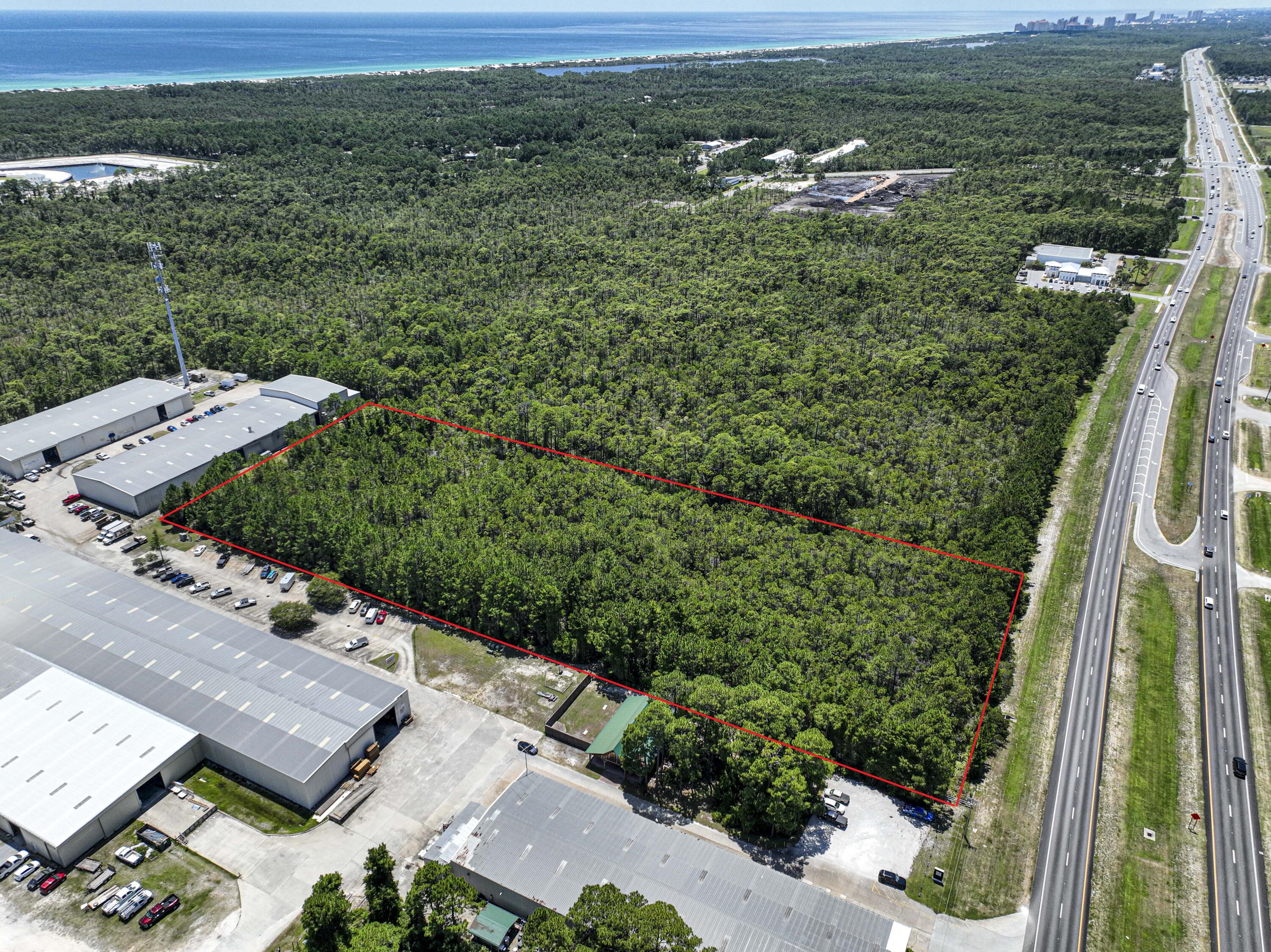 Exceptional 5.67-acre commercial parcel with over 300 feet of frontage on US Highway 98, strategically positioned in the fast-growing corridor of Santa Rosa Beach. Zoned Village Mixed Use (VMU), this versatile property offers endless development potential -- including retail centers, office space, hospitality, or multi-use commercial projects.Located just west of Scenic Highway 30A and minutes from the beaches, this site boasts outstanding visibility, strong daily traffic counts, and direct access from both eastbound and westbound lanes. The land is high and dry with a favorable elevation and a clean, developable footprint.All major utilities are available at the road -- including public water, sewer, electric, and natural gas. Simplifying the development process.