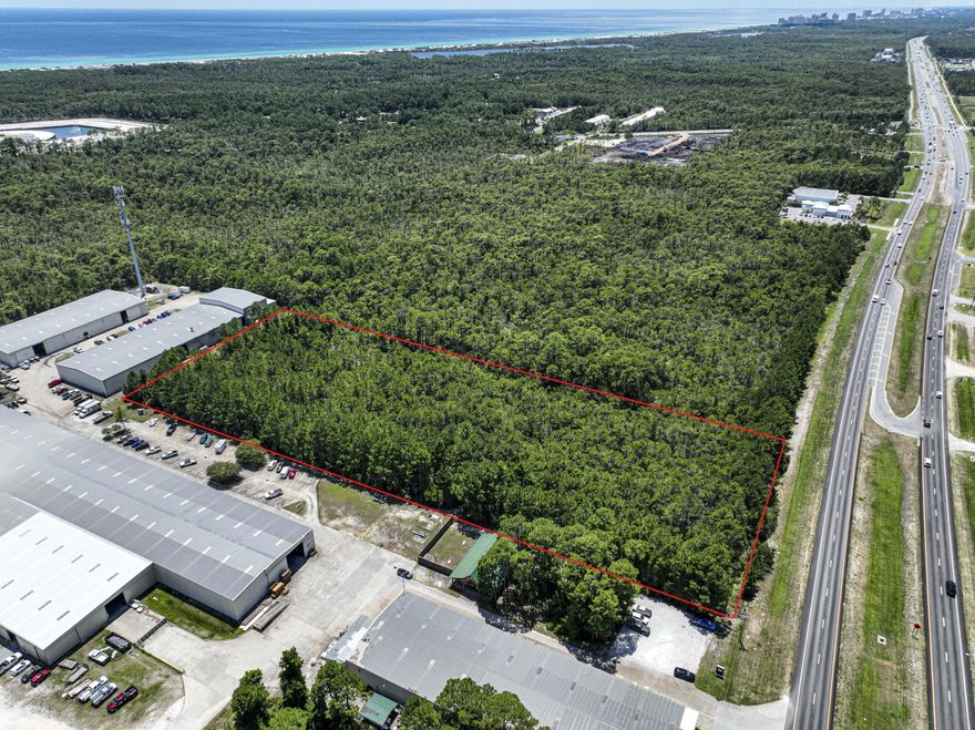 Exceptional 5.67-acre commercial parcel with over 300 feet of frontage on US Highway 98, strategically positioned in the fast-growing corridor of Santa Rosa Beach. Zoned Village Mixed Use (VMU), this versatile property offers endless development potential -- including retail centers, office space, hospitality, or multi-use commercial projects.Located just west of Scenic Highway 30A and minutes from the beaches, this site boasts outstanding visibility, strong daily traffic counts, and direct access from both eastbound and westbound lanes. The land is high and dry with a favorable elevation and a clean, developable footprint.All major utilities are available at the road -- including public water, sewer, electric, and natural gas. Simplifying the development process.