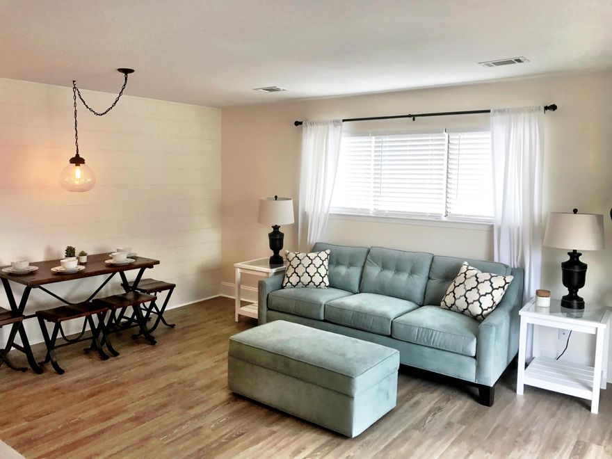 Your search for the perfect beach getaway will be over when you see this 2nd floor Cross Creek condo! It's an end unit with a lovely balcony and has just been completely remodeled from top to bottom! As you walk in the front door you notice the new wood look vinyl plank floors and lighting throughout, and then your eye is drawn to the ship lap accent wall behind the dining table. In the kitchen you immediately notice the new cabinets, updated appliances, and fantasy brown granite. In the bathroom your eye is drawn to the custom tile shower that looks like it is straight out of a magazine! The entrance to the bedroom greets you with a stained glass transom window, and as you enter the bedroom you picture yourself curled up in the plush bedding and realize this is your oasis.