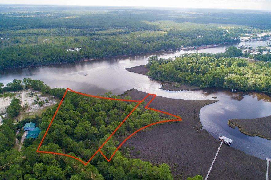 POTENTIAL PRIVATE ESTATE, FAMILY COMPOUND OR DEVELOPMENT on over 1700' of prime WALTON WATERFRONT w/ this high & dry, usable, secluded, wooded 5+ Acre parcel! Boundary, Wetlands & Topo surveys done! All paved roads leading in from Hwy 98! This one of kind oasis is ideal for those wanting PRIVACY & TRANQUILITY. Located at the mouth of Peach Creek & the Intracoastal Waterway, nearly 1/4 of a mile of protected deep water for your boat & just minutes from the bay! The water & territorial views from even your first floor of many potential building sites are just incredible & feel like you're a world away. Multiple potential dock scenarios. Very unique & rare opportunity in this area!!