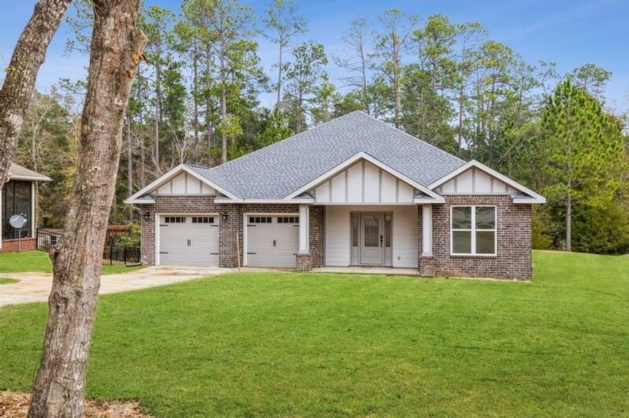 Semi-custom home built and designed by KG II Development in one of the most desirable neighborhoods in Crestview.  Four bedrooms and three bathrooms with an office!  Open floor plan. Third bathroom is handicap accessible with comfort height commode and accessible shower. Owner's bath has a walk-in shower and freestanding soaking tub along with a huge owner's closet.  Beautiful covered back porch overlooking conservation area guarantees no back yard neighbors other than an assortment of wildlife.  But there is still room for a nice pool!