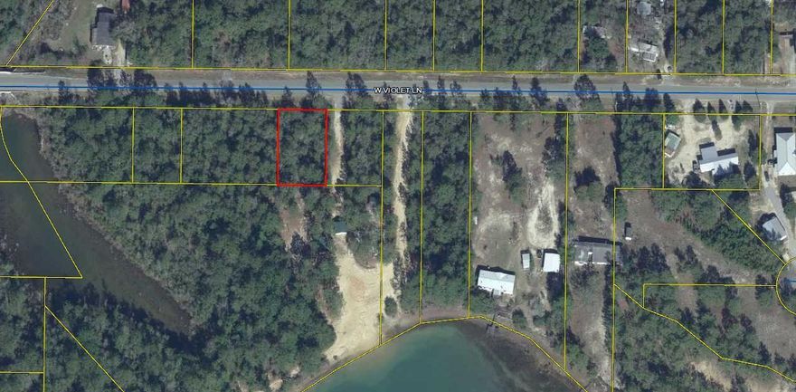Beautiful wooded lot on paved road.  All woods across from property, almost private.  There is Beaver Lake nearby.City water available.