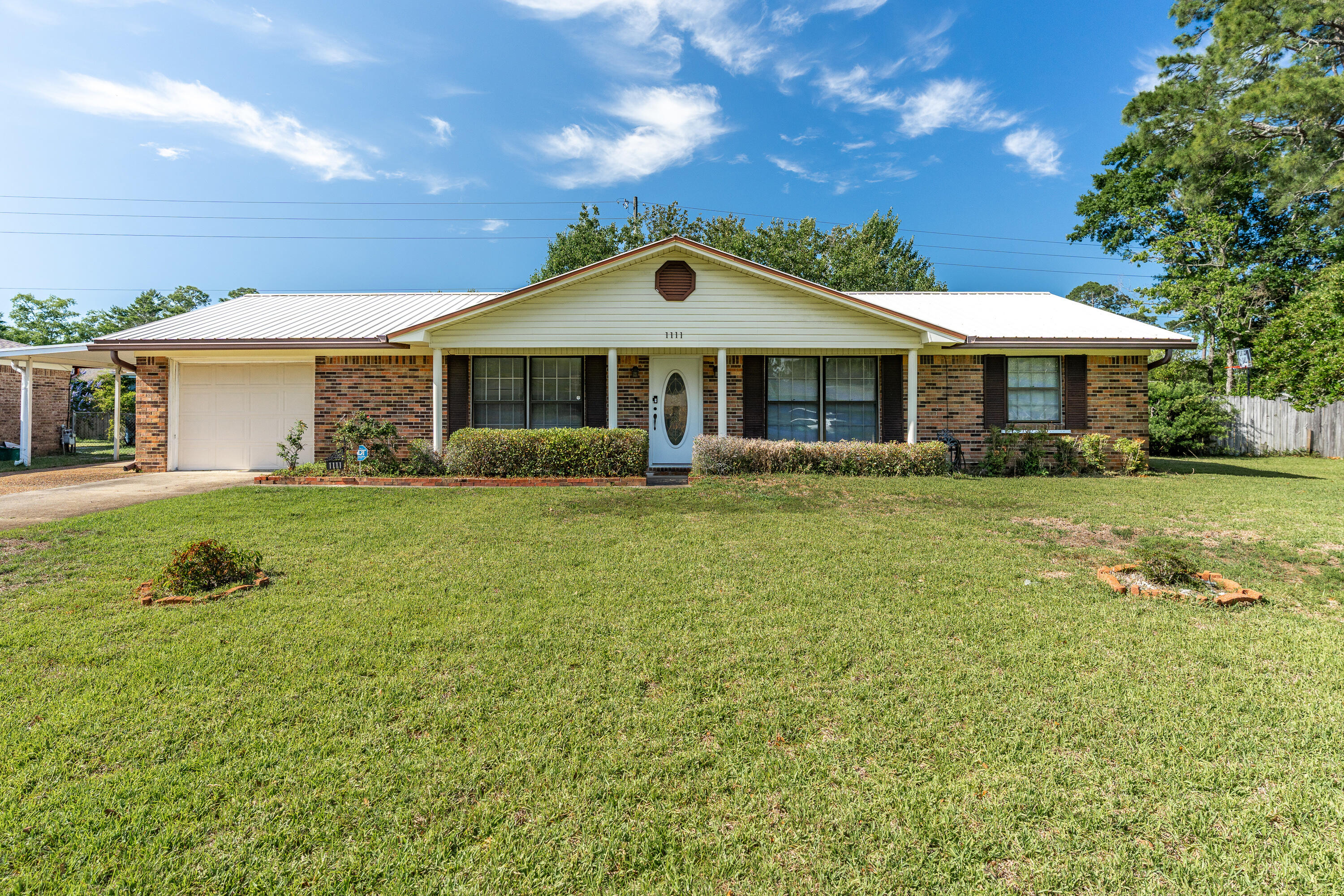 Charming Renovated Home in Palm Estates - Sunroom & Enclosed Porch Included!Welcome to this beautifully updated home located in the heart of Niceville, just minutes from Eglin AFB, top-rated schools, shopping, and more. Nestled in the desirable Palm Estates community, this home boasts both a bright sunroom with premium Levolor cellular shades and an additional enclosed porch--perfect for year-round enjoyment.Step inside to discover stylish vinyl flooring throughout and a fresh, open layout offering versatile living spaces. The front entry opens to a spacious dining or den area, seamlessly connecting to the kitchen and main living areas. The upgraded master bath features a modern vanity. With abundant storage, thoughtful upgrades, and a prime location, this is a gem!
