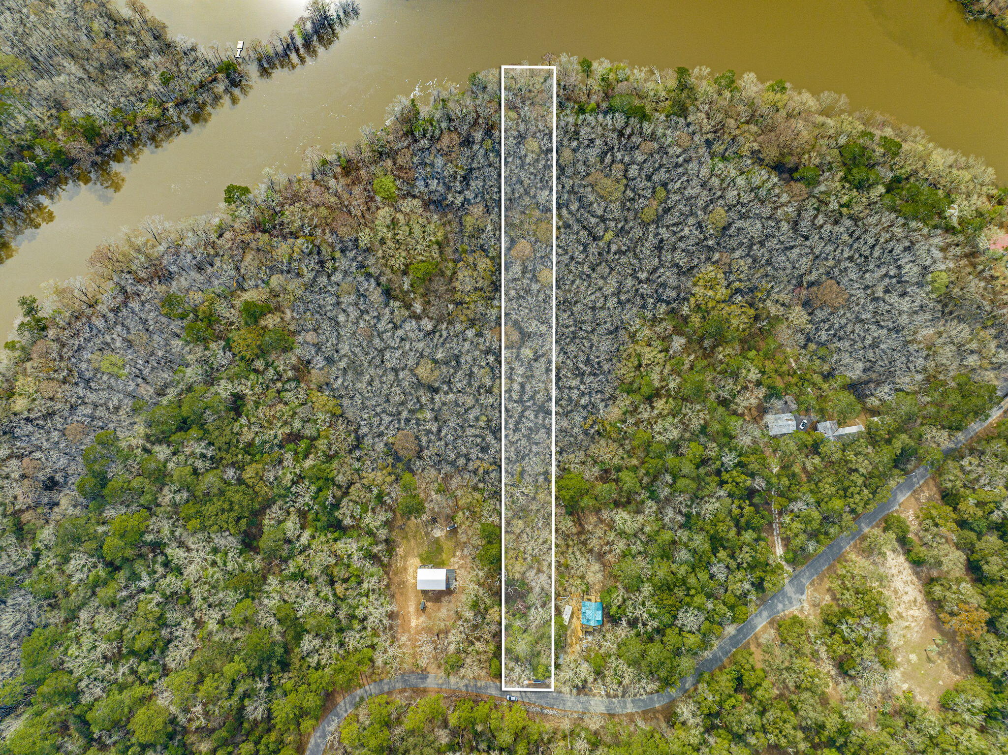 Beautiful affordable lot located on the Choctawatchee River with potential water access. This gorgeous private lot is located in a wooded sanctuary just 30 minutes north of 30A beaches and attractions while being tucked away from all the hustle and bustle. With it being one of the largest lots in the neighborhood it will offer an amazing property for your future getaway! All information is deemed accurate but should be confirmed by buyer or buyers agent.