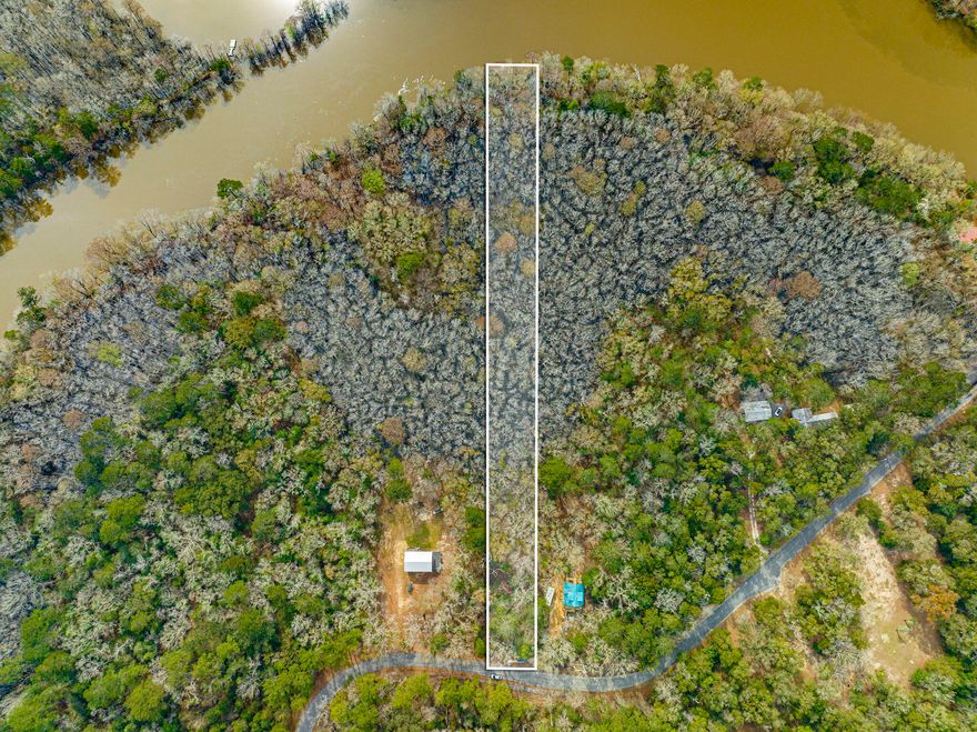 Beautiful affordable lot located on the Choctawatchee River with potential water access. This gorgeous private lot is located in a wooded sanctuary just 30 minutes north of 30A beaches and attractions while being tucked away from all the hustle and bustle. With it being one of the largest lots in the neighborhood it will offer an amazing property for your future getaway! All information is deemed accurate but should be confirmed by buyer or buyers agent.