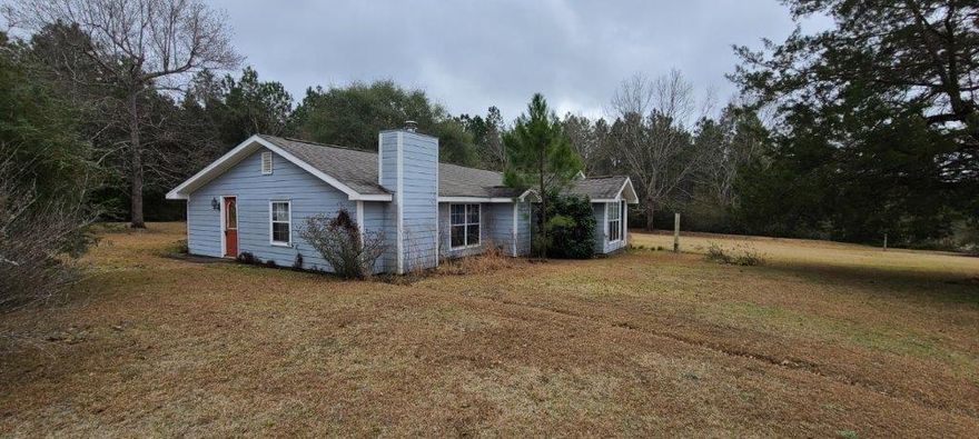 Here's Your Next FLIP! Check out this large 3 bed 2 Bath Home, almost 2,000 sqft. on 1 acre of land in Laurel Hill! House was in the middle of a complete rehab when operations halted. House still needs a kitchen, new floors (subfloors done), 1 bathroom needs work, Exterior, windows and roof were redone about 8-10 years ago, and it could use some ceiling work and a few other cosmetic touch ups as well. HVAC works well, but the water heater might need to be replaced.Similar sized houses in the area selling for 220K-240K.