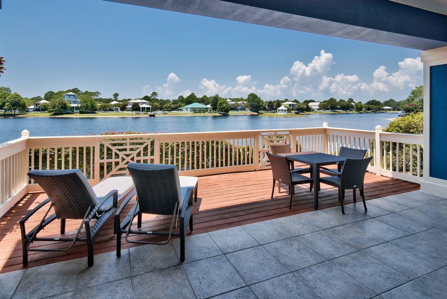Enjoy panoramic views of Crystal Lake - a true spring fed lake in Sandestin. The downstairs location and the large deck provide a peaceful place to relax and enjoy the views of the lake. Plentiful windows, sliding glass doors, and 9' ceilings allow for an open, bright, and airy feeling. The split floor plan provides both bedrooms with privacy. These owners have further upgraded with kitchen tile backsplash and crown molding. Enjoy as a permanent residence, second home, or a vacation rental. Come and enjoy all the amenities that Sandestin has to offer! This 2,400 acre resort boasts the most beautiful white sandy beaches, four championship golf courses, a world class tennis center with 15 courts and a 98 slip full service marina, and The Village of Baytowne Wharf.