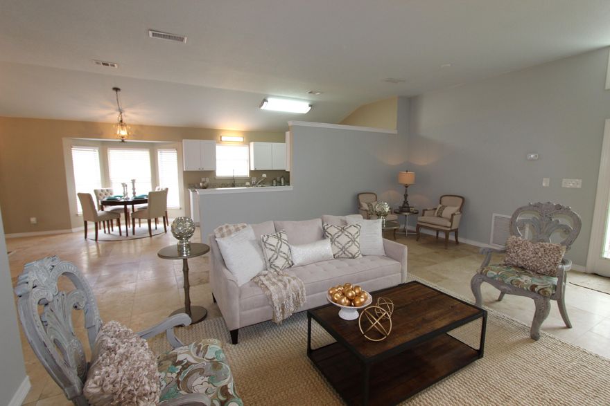 NEWLY RENOVATED and PRICED TO SELL, this 2109 sq. ft., 3 BR plus Sunroom, all one level home with 2 car garage and fenced back yard is located just blocks from both the BEACH and the BAY, between Destin Commons and Silver Sands in a small community with POOL! NEW ROOF IN 2015 AND VA APPROVED! Enjoy entertaining in the open floor plan, the newly renovated kitchen with new cabinets, stainless steel appliances and granite counter tops, new light fixtures and/or ceiling fans in every room. The master is HUGE and has a separate sitting area or office space and the master bath cabinets, counter top and light fixtures are also new. Water heater, thermostat and security system were purchased in 2013. The curtains in the Master Bedroom are for staging only and do not convey.