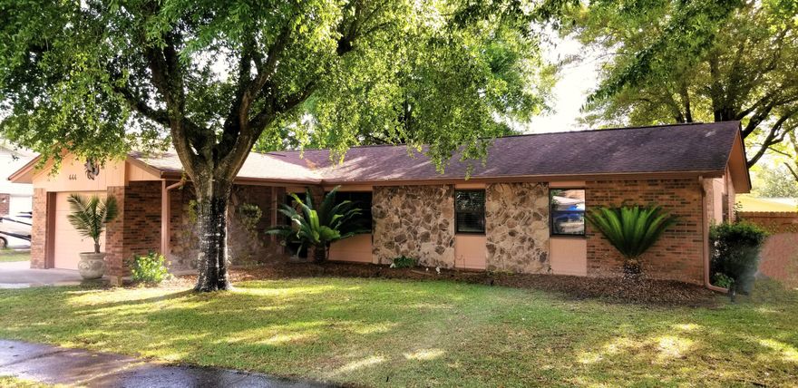 Beautifully Updated Home, Excellent Location. Meticulously Maintained Inside & Out. Living Room w/ Fireplace & Lofted Ceiling. Kitchen Has Granite Counters w/ Huge Island, Workspace, Stainless Style Appliances, Cherry Soft Close Cabinets. Upgraded Slider Door From Kitchen To Outdoors. Large Paver Patio, Raised Bed Garden, & Shaded Back Yard. Hallway Leads To Primary BR & Completely Updated Primary Bathroom w/ Granite Vanity, Step In Shower, LVP Floor, New Lights & Plumbing Fixtures. Guest BR In Corner Location w/ Two Windows & Nice Sized Closet. 3rd BR w/ Closet & Ceiling Fan. Updated Guest Full Bathroom w/ LVP Floors, Updated Vanity, Fixtures, & Stack Storage. Garage For Auto & Oversized Driveway For Parking. Fenced Backyard w/ Nice Storage Shed, & Paver Parking Area. Better Call Today!