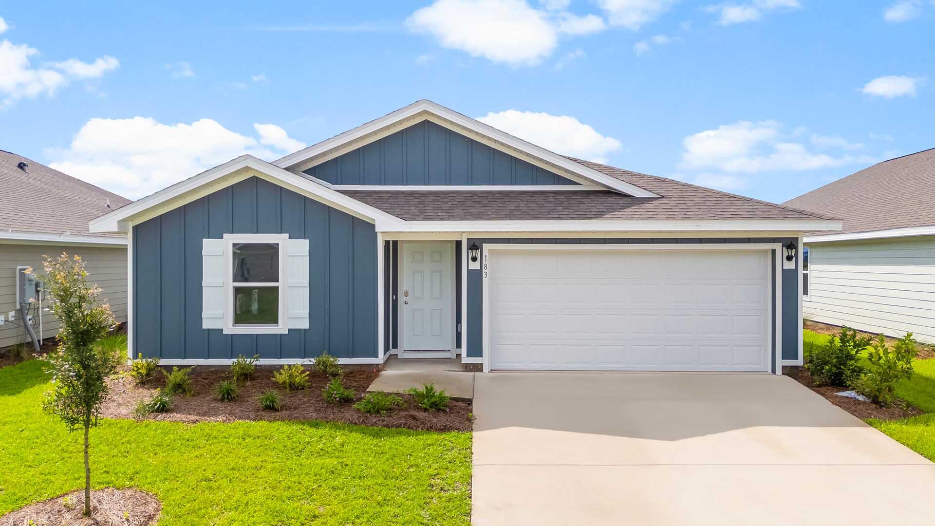 Welcome to 183 W Gray Owl Drive at Owl's Head Farms in Freeport Florida. This home is ready for move in and has two spacious bedrooms off the front entry. Continuing through the entry hall, a third bedroom, ideal for a home office or flex space, is located on the adjacent hall that hosts the washer and dryer hookups next to the two-car garage--a practical touch for everyday living. The EVP flooring throughout the common areas allows for a seamless transition through the living area. The home truly shines as you step into the open concept living area. The kitchen stands out with granite countertops, pantry, a sleek stainless steel appliance package, and a central kitchen island that offers plenty of prep space and seating area. The adjoining dining space is perfectly positioned for casual meals or entertaining, while the living room is bright and inviting, with views of the backyard through large windows. Nestled in the back of the home is the primary bedroom which is spacious and features a private ensuite bath with a double vanity, large shower, and a walk-in closet designed for optimal storage. The guest bedrooms feature ample closet space, carpet and share a well-appointed full bathroom with modern finishes and durable engineered vinyl plank flooring, perfect for family or guests.
Step outside to the back patio, where you can enjoy the serene surroundings of this growing community.
