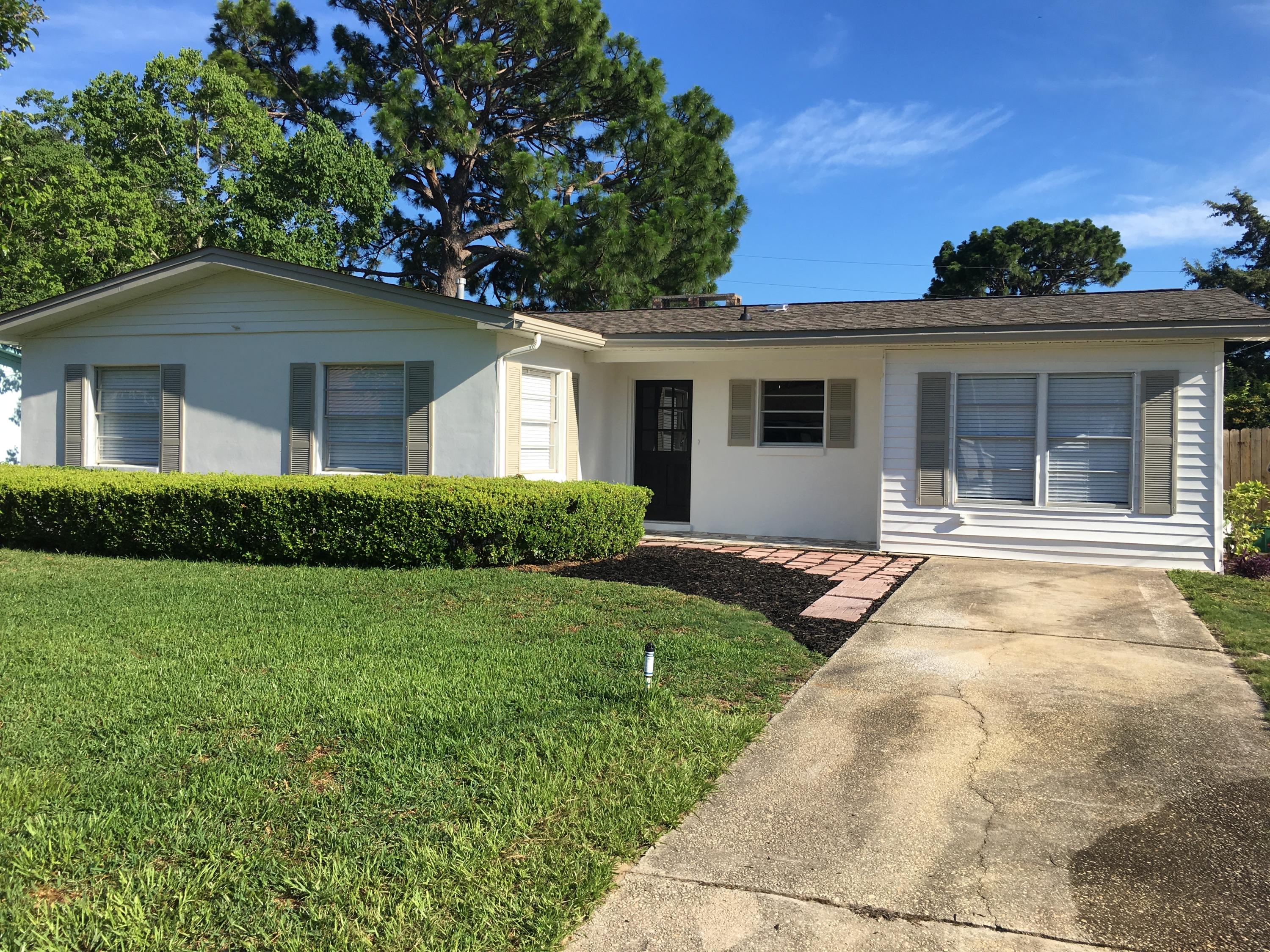 Ready for new owners! This is a 3 bedroom, 2 full bath home with a park like backyard. Located close to Eglin AFB, Hurlurt Field, shopping, Medical facilities, restaurants. The exterior of the home has been painted and there is a new diminsional roof and all new roof decking April 2017. There is lots of natural light that streams in to make this an inviting home. There is a huge bonus room that can be used for many types of space. The master bedroom has french doors that lead to a patio looking out to the private backyard. Two additional bedrooms are both good sized and share a renovated full bath. There is access to the backyard from the street behind the fence, ideal for RV, boat, or just additional parking and lots of room to add a gate. Come see for yourself!