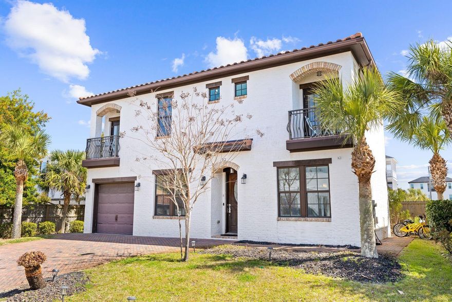 Discover the perfect blend of luxury, comfort, and coastal charm in this stunning beachside retreat, just a short stroll from the sugar-white sands and crystal-clear waters of the Gulf. Nestled in an exclusive cul-de-sac of only nine homes, this meticulously updated residence offers an unparalleled seaside escape--whether as a dreamy vacation home or a high-performing rental investment.The home's distinctive architecture showcases unique brick siding with a hand-smeared mortar wash, while a wide driveway and attached garage provide convenience and ample storage. Inside, artisan details elevate the living spaces, featuring Italian tile floors, beamed ceilings, a wired sound system, and an inviting electric fireplace. The gourmet kitchen is a chef's delight, complete with stainless steel appliances, a granite island, and a walk-in pantry. A main-floor bedroom and bath offer effortless accessibility.

Upstairs, a bonus living room with a built-in bar opens to a private balcony perfect for entertaining. The second level also hosts three additional bedrooms, including a bunk room and an exquisite master suite with a cozy fireplace, private balcony, and spa-inspired bath with dual showers and a soaking tub.

Step outside to your own private oasis, featuring a spacious back deck with a luxurious hot tub equipped with Bluetooth speakers. Rinse off after a day at the beach in the outdoor shower before settling in for an evening under the stars. A beach chair service ensures effortless days by the water, while nearby restaurants and boutique shops, including the renowned Pompano Joe's, are just a short walk away.

Adding to the ease of ownership, the HOA covers full lawn maintenance, allowing you to enjoy a beautifully manicured landscape without the responsibility.

All new furnishings in 2021, including appliances and TVs, this exceptional property is move-in or rental-ready. Don't miss this rare opportunity to own a piece of coastal paradise. Schedule your private showing today!

Established rental history: in 2021 the property was rented only half of the year starting June 1 and did $65,000 in gross rental for the year. 2022 the property did $79,000 in gross rental income for the year. As of April there is already $31,000 on the books for 2025 rentals.

