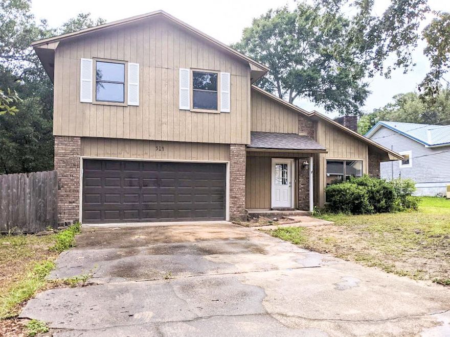Great opportunity to own in Niceville! The living room features vaulted ceiling, tile floors & gas fireplace. Open kitchen with large breakfast nook. Back yard has lots of room for a pool, upstairs and ground floor decks perfect for viewing the oversized lot! The guest bath tub is cast iron and all of the plumbing has been replaced and has a 20 year warranty! New roof and water heather in 2014. Gas stove, heat, water heater, and fireplace.