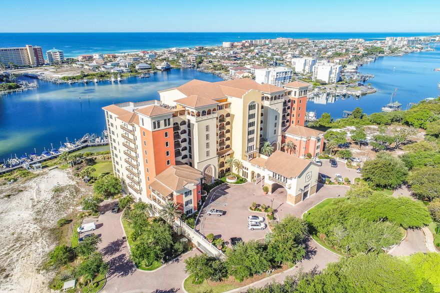 Located on a 35-foot bluff over-looking the Destin Harbor, Marbella is a Premier Condominium, offering the feel of a private residence with the ease of condo living. Unit 5H has Spectacular views of the Destin Harbor & Gulf of Mexico, stretching from the Destin Bridge to the Gulf. Unit 5H offers Spacious Living Spaces, 9 ft High Ceilings, 3 Bedrooms & 3 Full Bathrooms, Full Size Laundry Room, Plenty of Storage (including separate storage unit), 2 Covered Parking Spaces & Spectacular Balcony to enjoy the Florida Lifestyle. The condo is well appointed with updated wood-look tile in a light coastal color palette throughout the common area and flows into the Master Bedroom. The Master Bedroom is on the Harbor side with full sliding door to the balcony & impressive view. (Read More)....